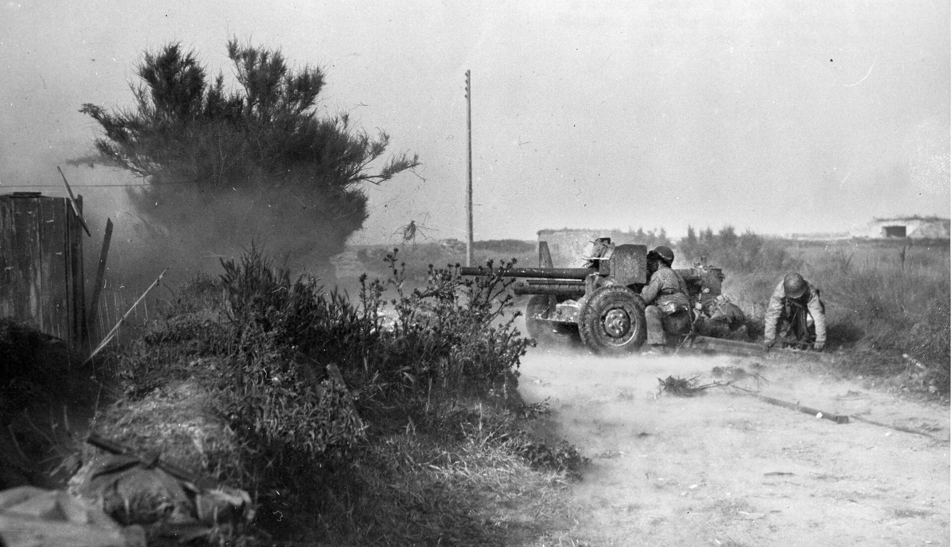 American paratroopers fired a 57mm anti-tank gun at the Germans during the early stages of the fight. The 57mm gun was the heaviest weapon available to the lightly armed paratroopers and provided much-needed firepower during desperate hours of combat against repeated German counterattacks.
