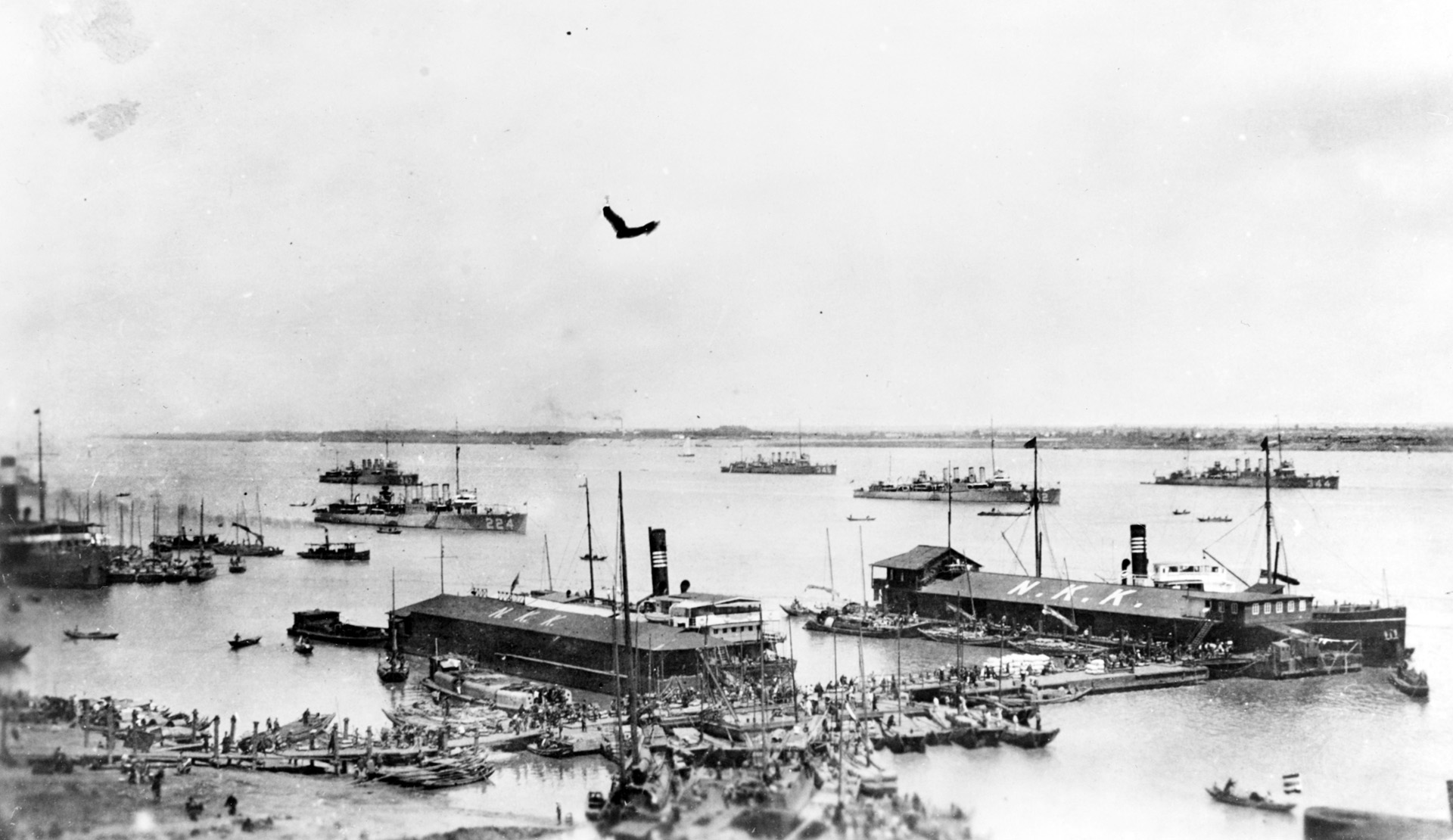 The U.S. Navy’s Asiatic Fleet off the harbor of Hankow, China, in 1923. USS Stewart is recognizable as the larger ship in the middle distance of this photograph. 