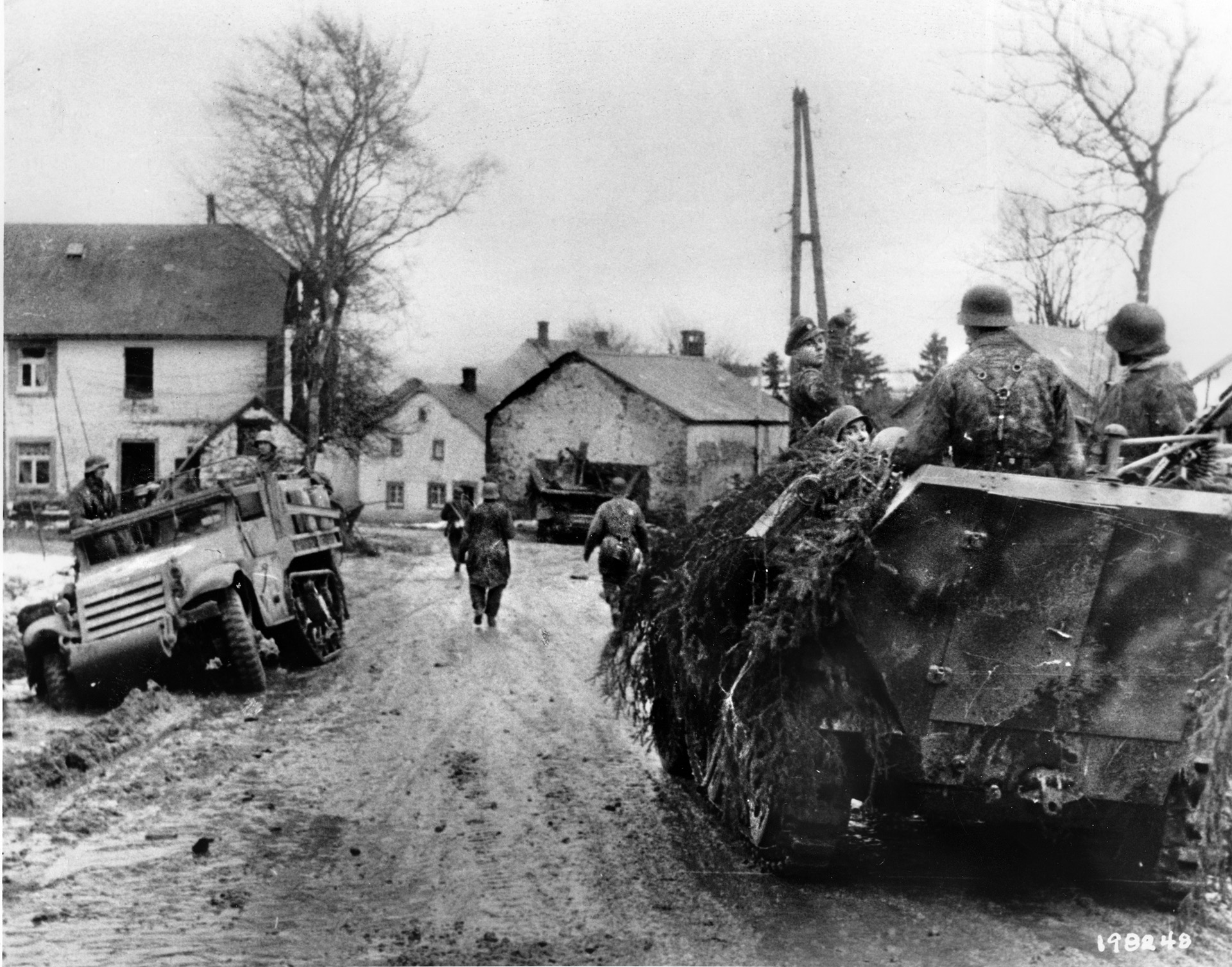 German soldiers enter a French village during the opening hours of the Ardennes Offensive of December 1944. Intelligence reports of a German buildup of men and materiel were virtually ignored by senior American commanders in the days leading up to the offensive.