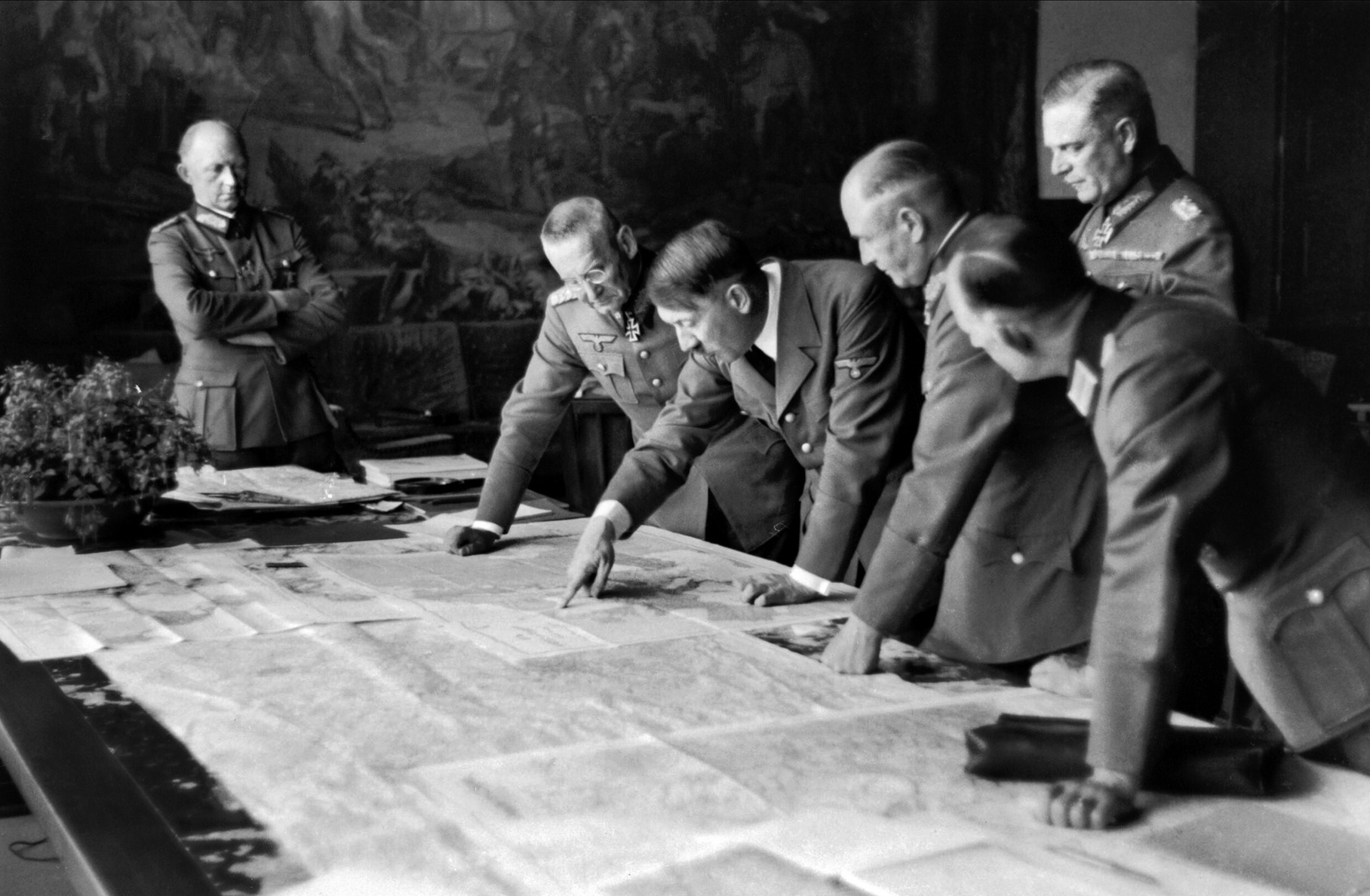 Hitler and several of his generals pore over a military map in this photo taken in 1940. Four years later, Hitler had become dissatisfied with many of his top commanders. When his subordinates expressed concerns for the success of the desperate gamble in the West, the Fuhrer was undeterred and ordered the Ardennes Offensive to proceed.