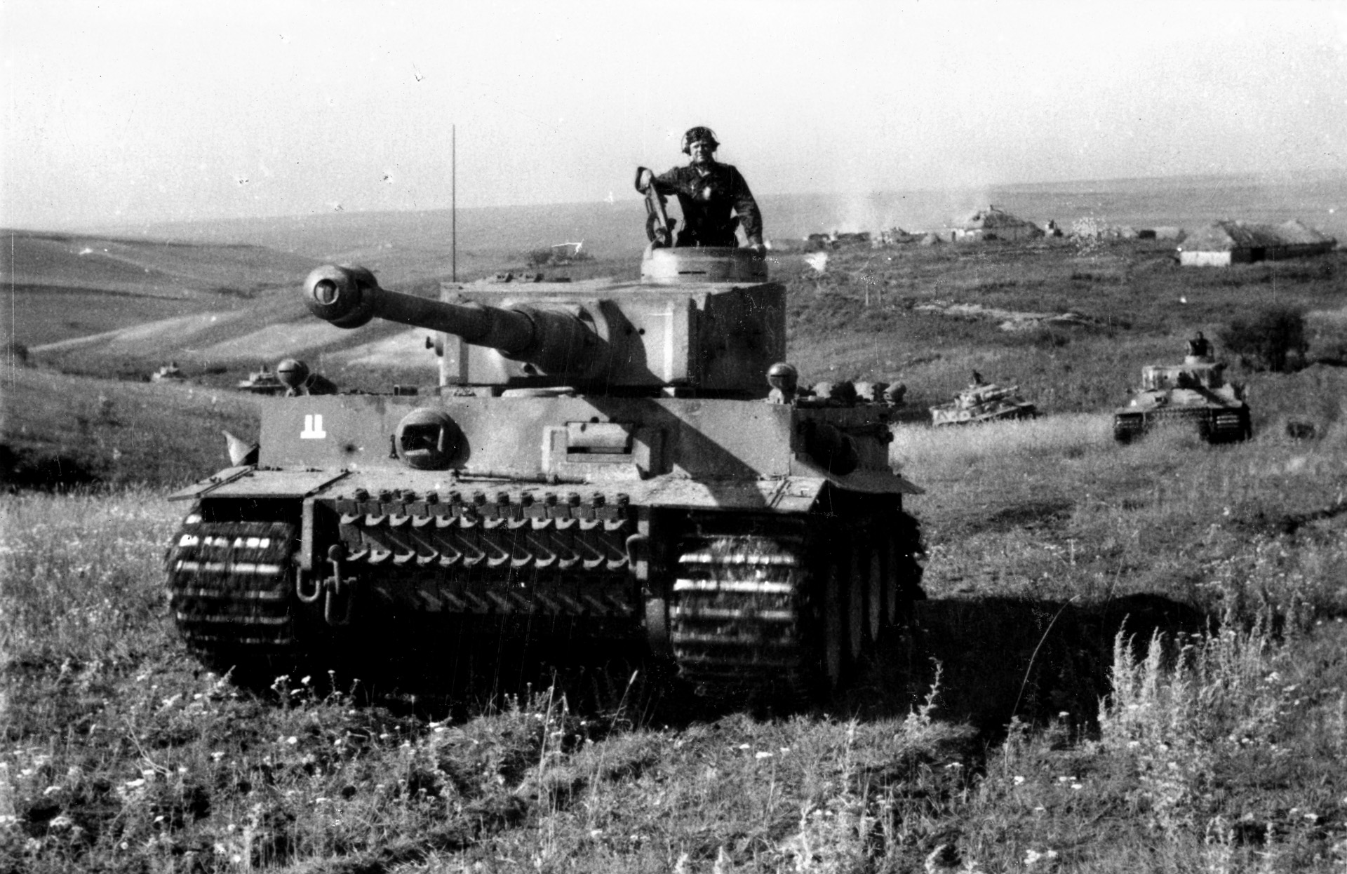 A Tiger tank of Waffen SS division Das Reich goes into action against Soviet forces in the southern part of the Kursk salient. Its 88mm gun could penetrate the armor of a Soviet T-34 at 1,800 yards.