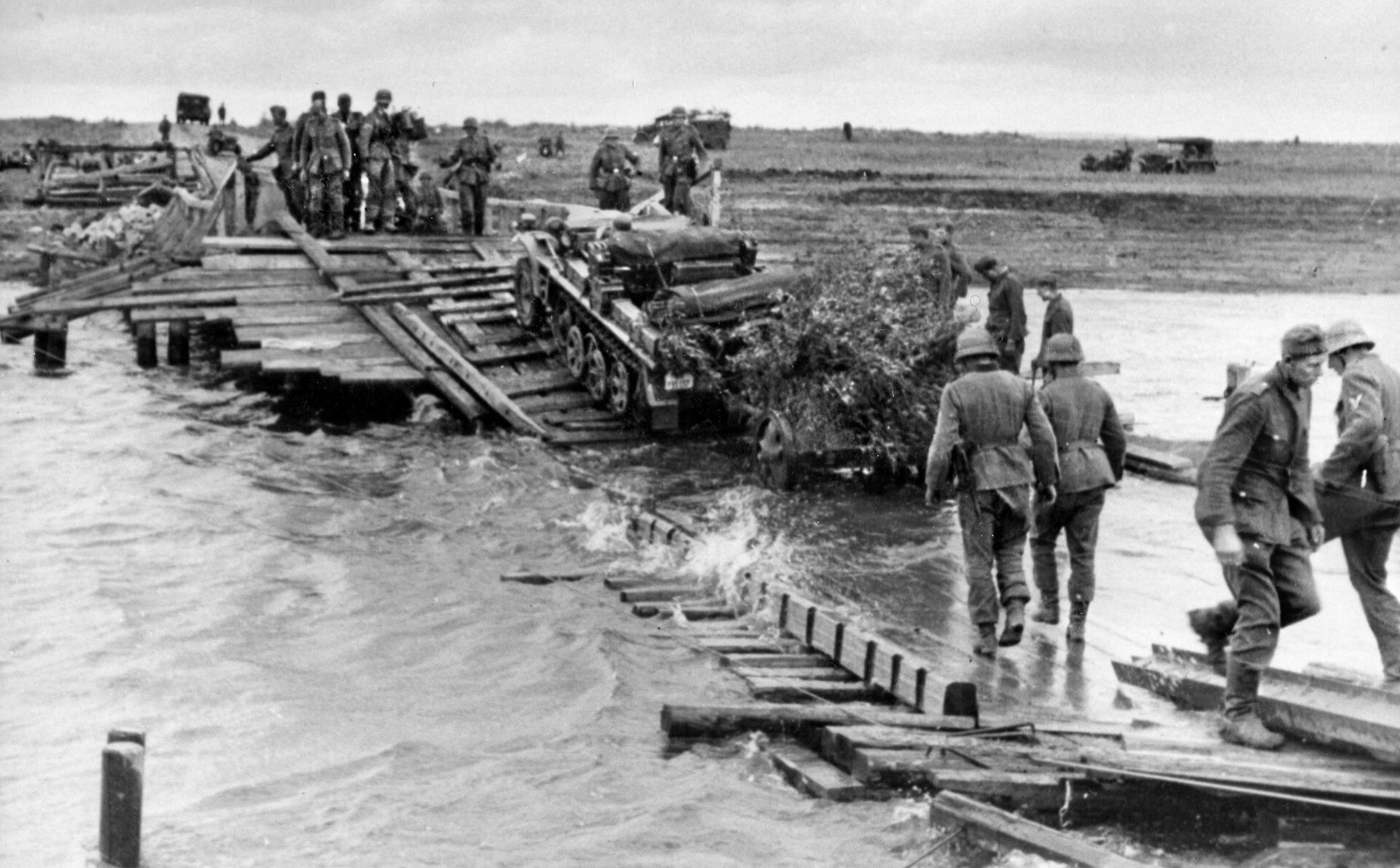 German armored vehicles struggle across a river during Operation Citadel. 
