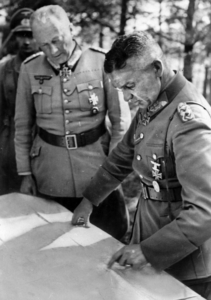 Field Marshal Gunther von Kluge (left) and Colonel General Walter Model confer during Operation Citadel. Model, who led the Ninth Army in the northern pincer at Kursk, failed to act decisively. 