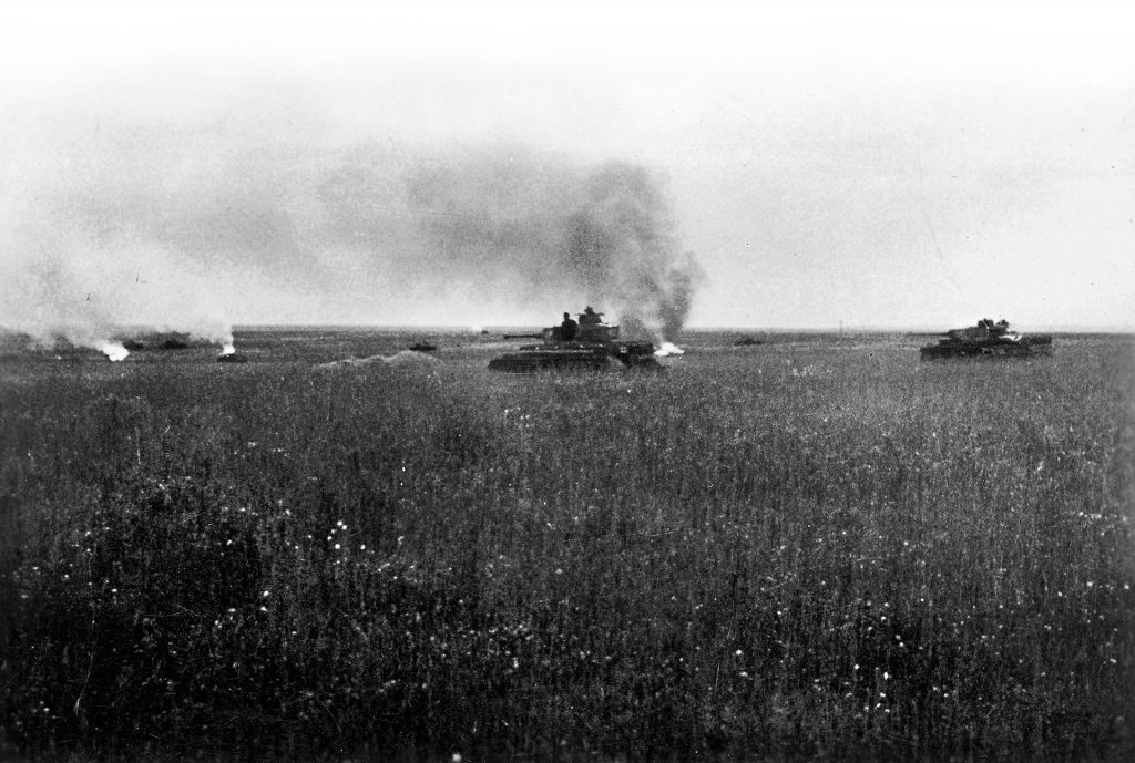 German tanks advance cautiously through the Russian steppe into the teeth of Soviet defenses. The Russians planted thousands of mines in the ground over which the Germans advanced.