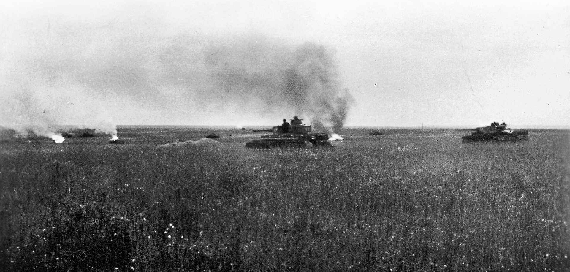 German tanks advance cautiously through the Russian steppe into the teeth of Soviet defenses. The Russians planted thousands of mines in the ground over which the Germans advanced.