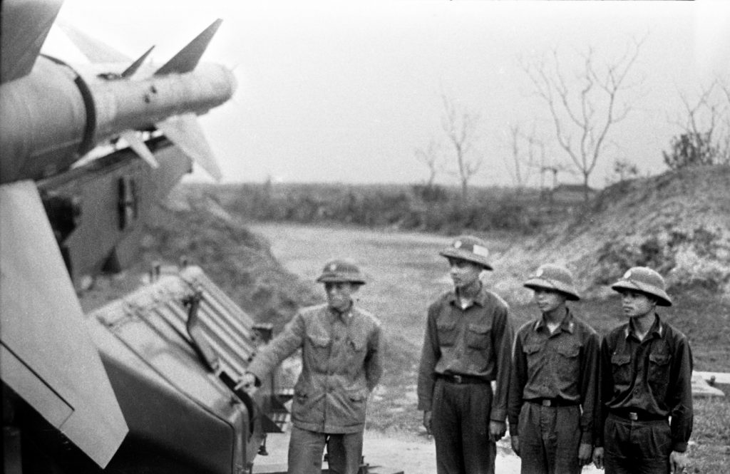 North Vietnam air-defense troops receive instruction in the use of the S-75 Dvina SAM system.