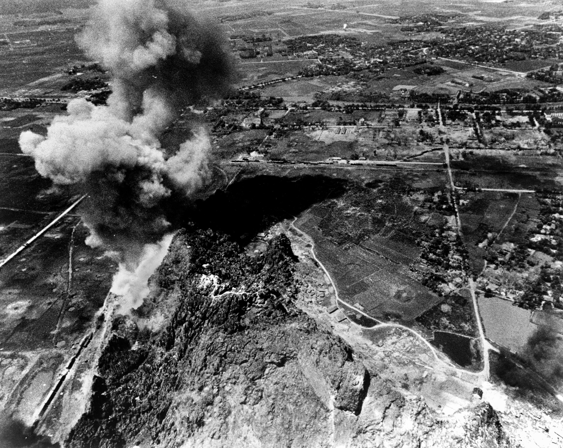 U.S. strike aircraft attack railway facilities in September 1966 at Ninh Binh 60 miles south of Hanoi. With the route-package system implemented in December 1965, Navy aircraft attacked targets in the coastal regions and the Air Force struck targets further inland. 