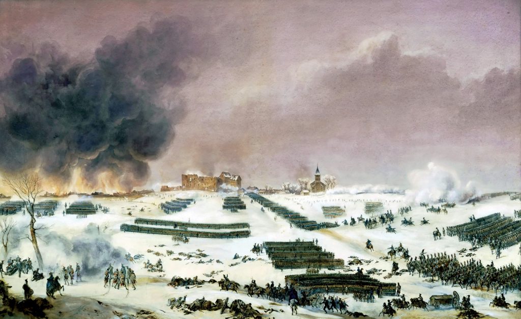 Nine-thousand French muskets of Marshal Pierre Augereau’s VII Corps advance in echelon on Eylau Cemetery on the morning of the battle. Losing their way in the swirling snow, Russian massed artillery devastated the two divisions.