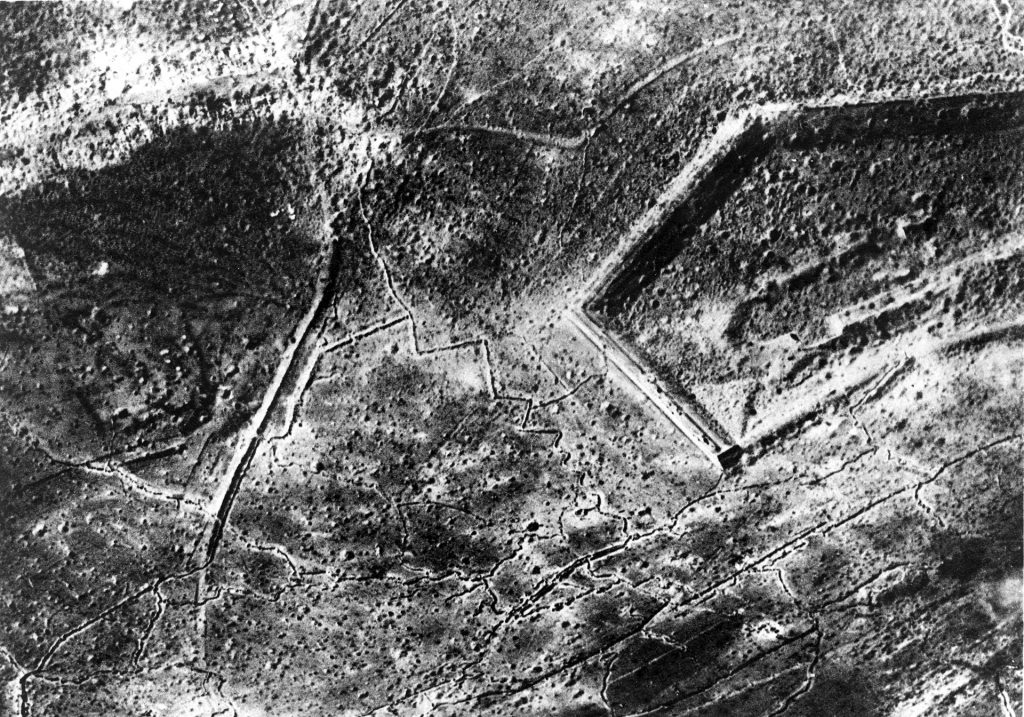 An aerial view taken of Fort Douaumont and the trenches surrounding it shows hundreds of shell craters.