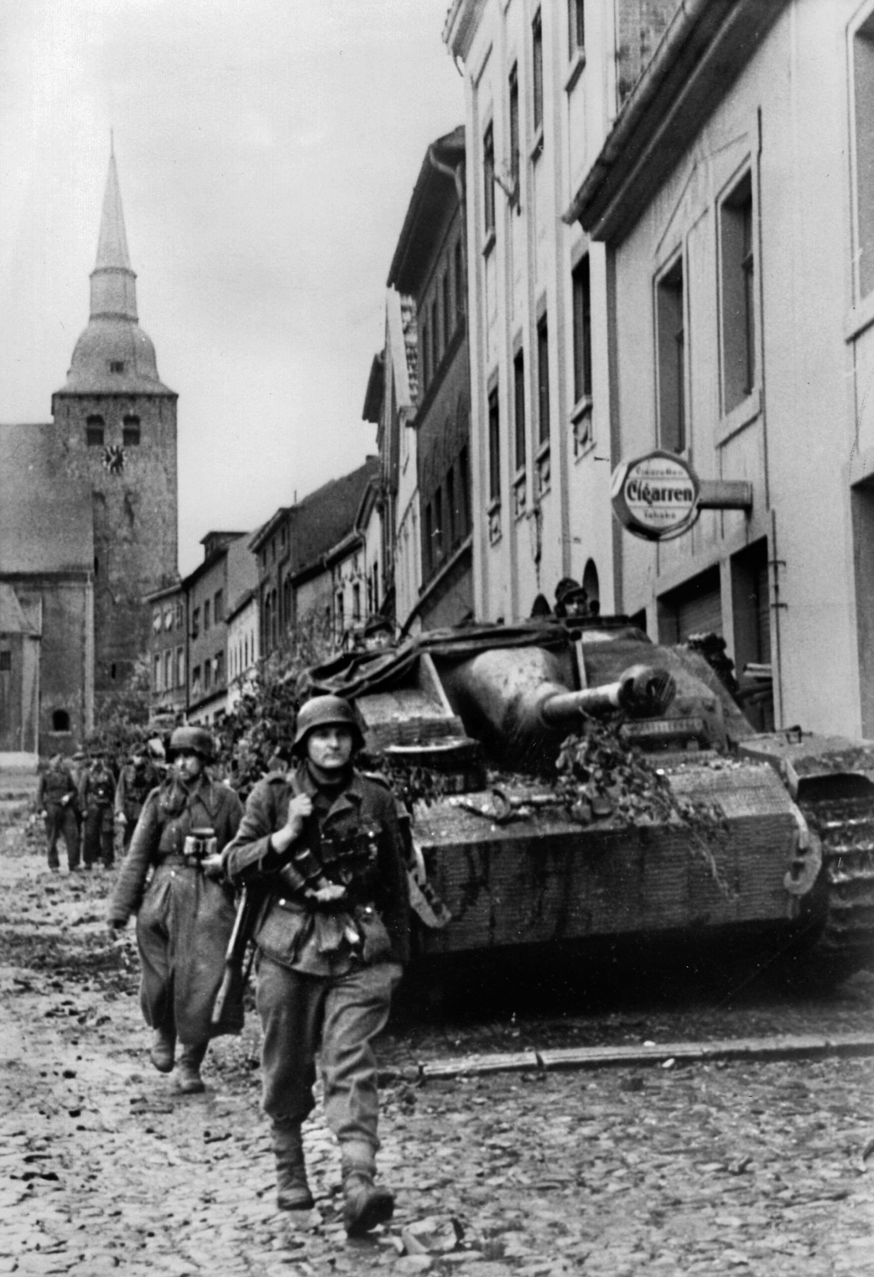 German armored infantry arrives in Aachen. The Germans rushed troops from Holland and as far away as Alsace to defend the historic city.