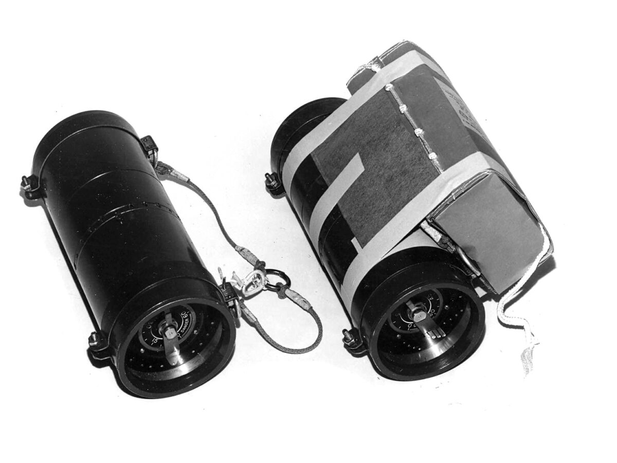  A rifle fire simulator (left) and machine-gun fire simulator with an attached parachute pack.