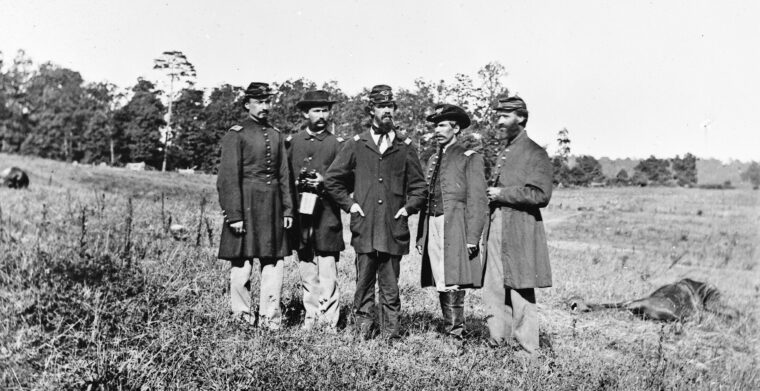 Officers of the 10th Maine Regiment photographed a few days after the battle at the location where the regiment made its stand. Jackson’s old division held the ground behind them in the distance.