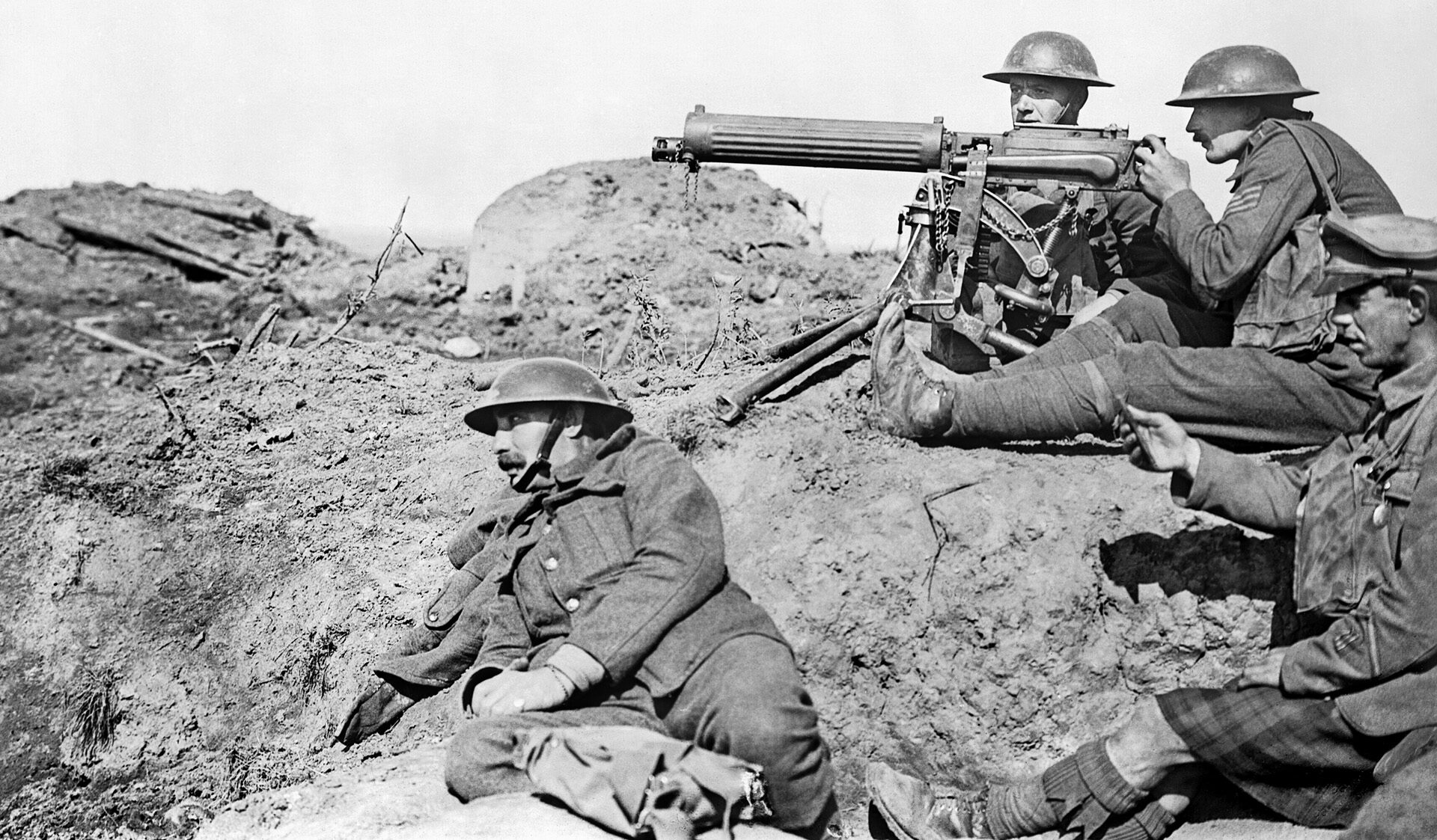The team of a British Vickers machine gun in action at the battlefront in September. The water-cooled heavy machine gun performed extremely well in the muddy conditions of the battlefield, but used copious amounts of ammunition.