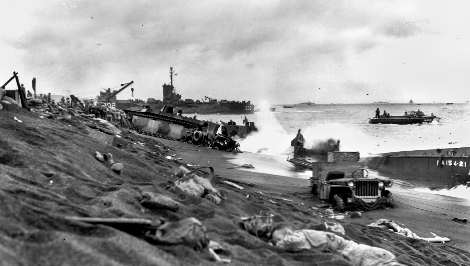 Marine dead, vehicles trapped in the sand, and swamped landing craft: contrary to intelligence reports that described the landing zones as ideal, the beaches were made up of coarse, black, volcanic crystals that were nearly impassable to men and vehicles. 