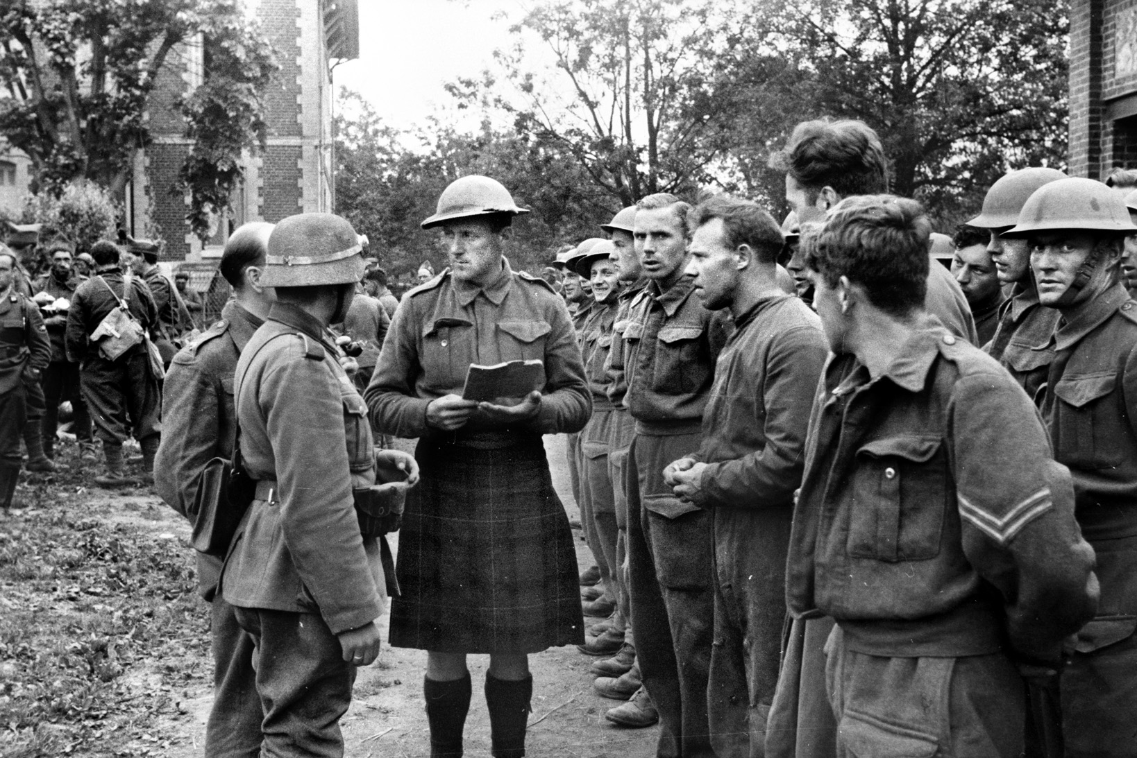 "For you the war is over" Highland troops of the 51st Division line up to accept their fate as prisoners of war.