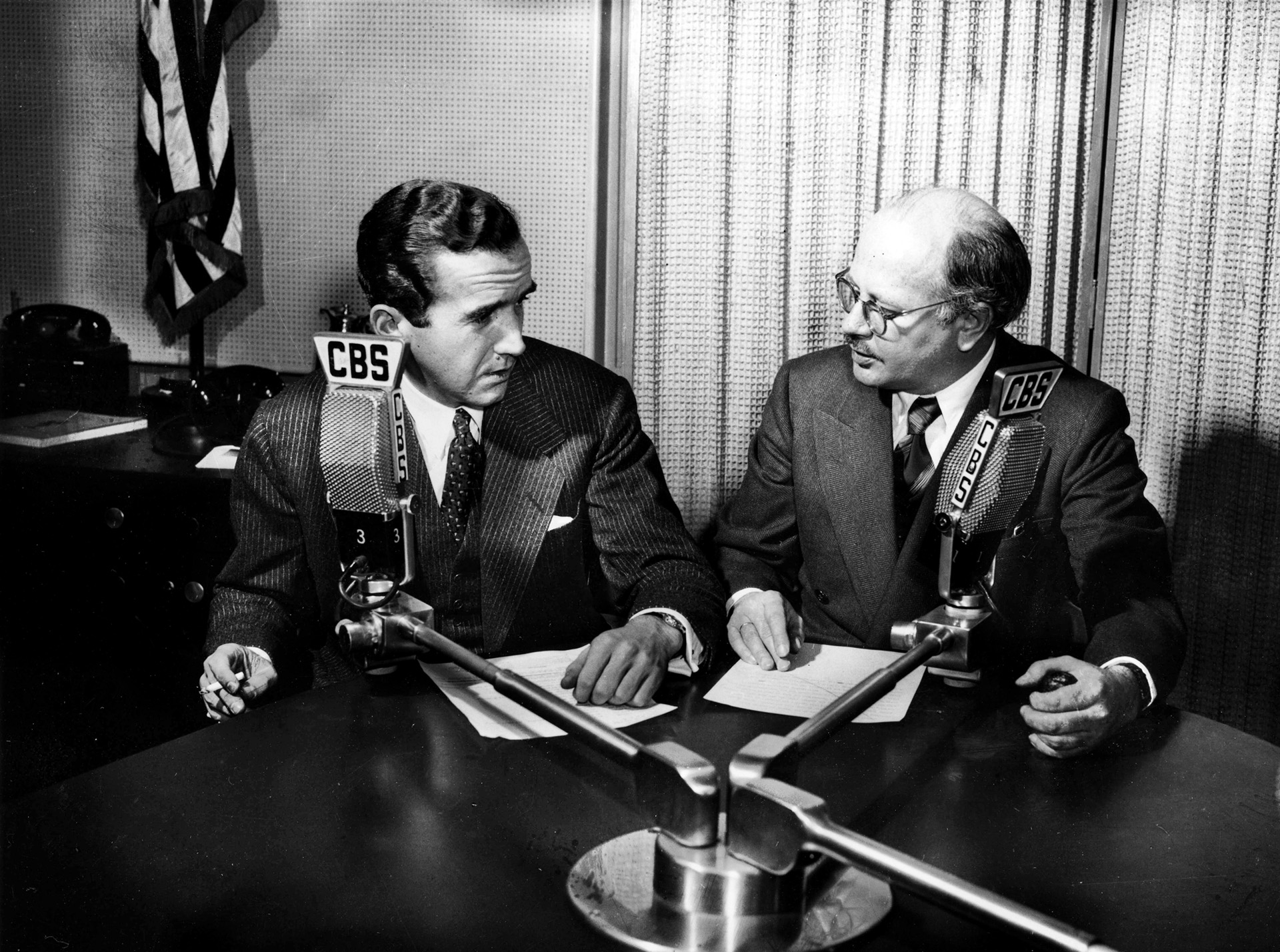 Vividly bringing the war home to America with their eyewitness accounts of the Battle of Britain and the Blitz were famed CBS broadcasters Edward R. Murrow (left) and William L. Shirer, shown here in their London studio. Their sympathetic accounts caused many Americans to rethink their stance of strict U.S. neutrality.