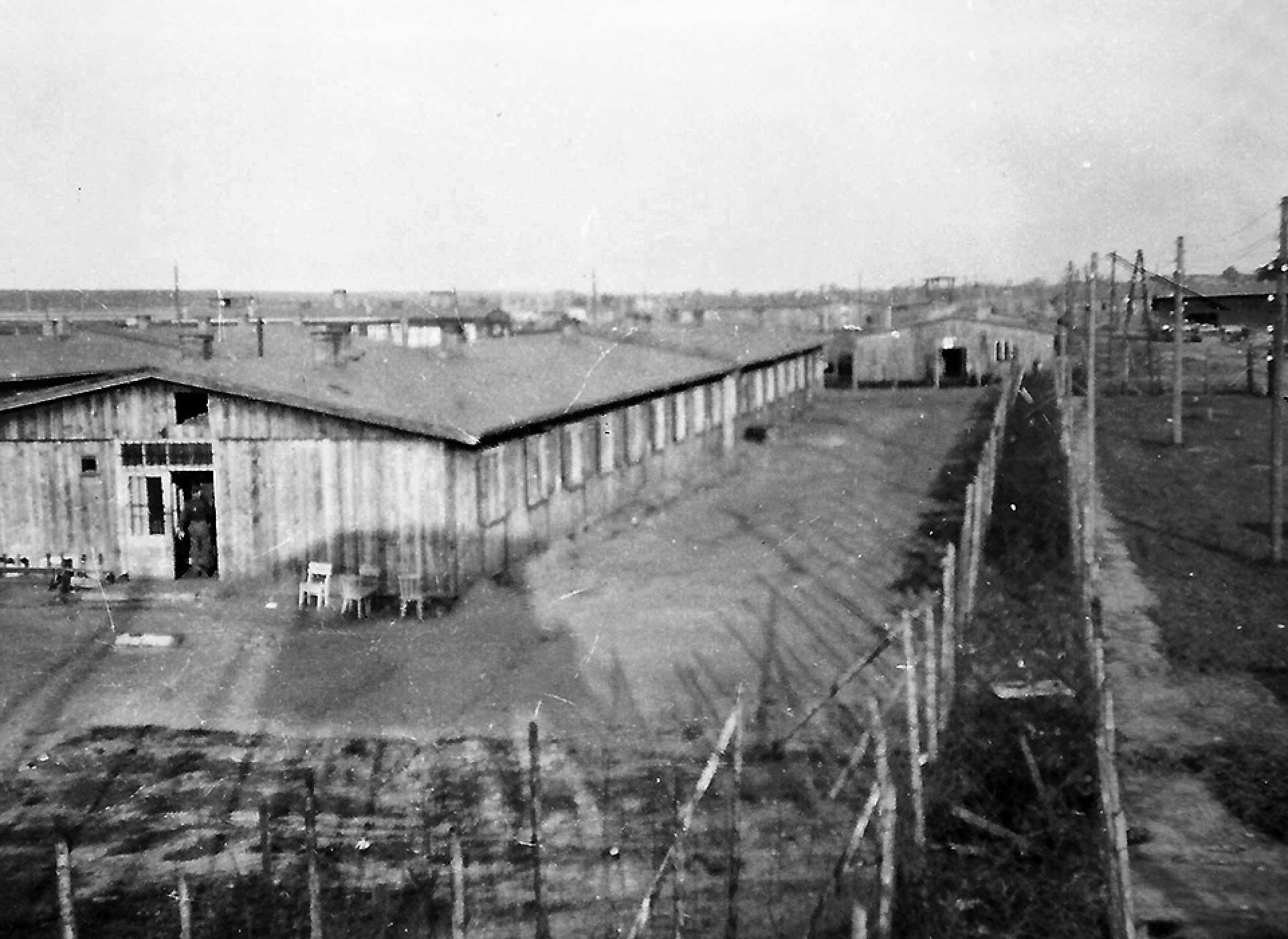 Barbed wire surrounds a barracks building at Stalag Luft I, the POW camp in northern Germany where Perry and some of his crew were imprisoned from March 1944 until the end of the war.