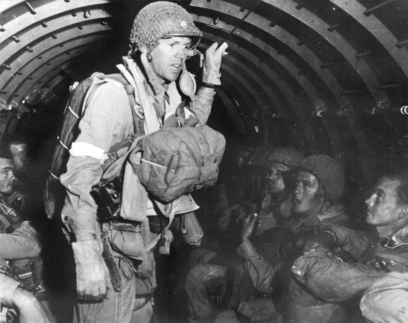 Lieutenant Colonel Charles W. Kouns, commander of 3rd Battalion, 504th PIR, 82nd Airborne Division, “psyches up” his men prior to their first combat jump. The 82nd took heavy casualties from “friendly” fire. 