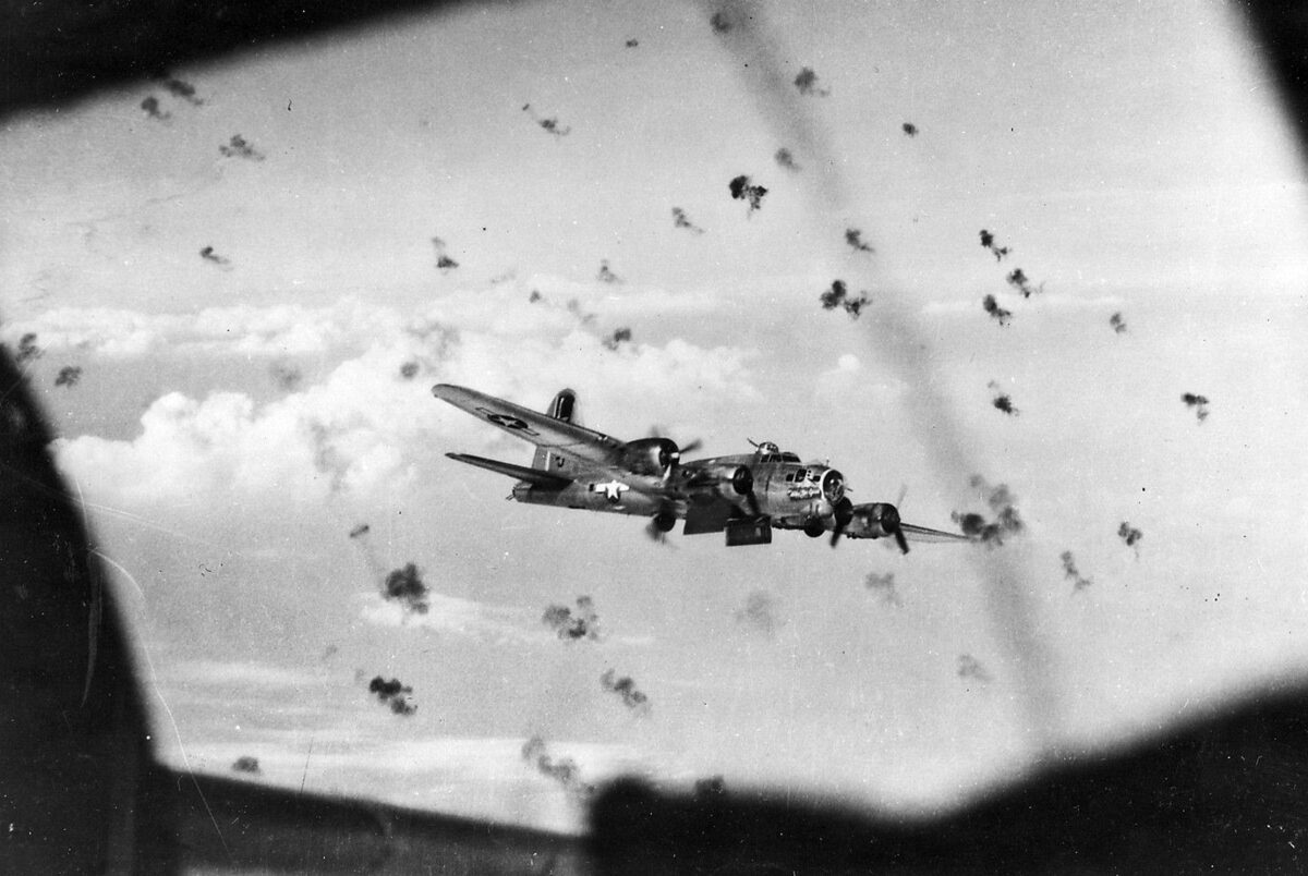 A B-17G flies through a barrage of heavy flak with its bomb bay doors open. B-17s dropped over 640,000 tons of bombs on enemy targets in Europe during the war. 