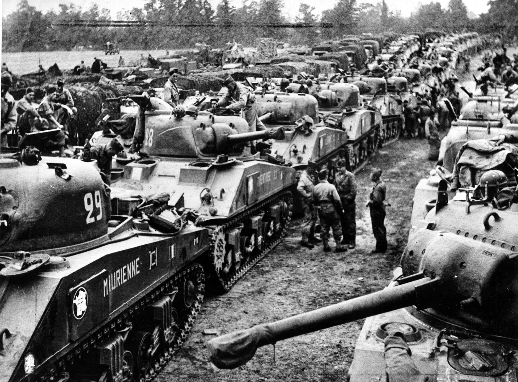 The U.S. supplied Sherman tanks to Leclerc's French 2nd Armored Division, shown here assembling after arriving at Utah Beach in Normandy on August 1, 1944.