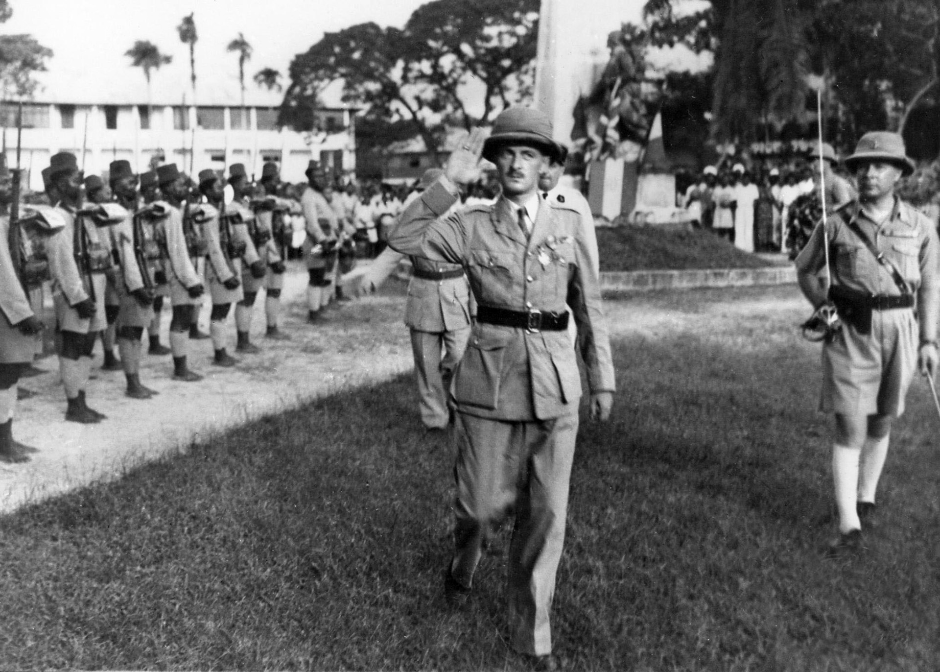 Then-Colonel Philippe Leclerc, one of Free France’s top field commanders, reviews French Senegalese troops in Chad, December 1940. The Free French army depended a great deal on colonial troops. 