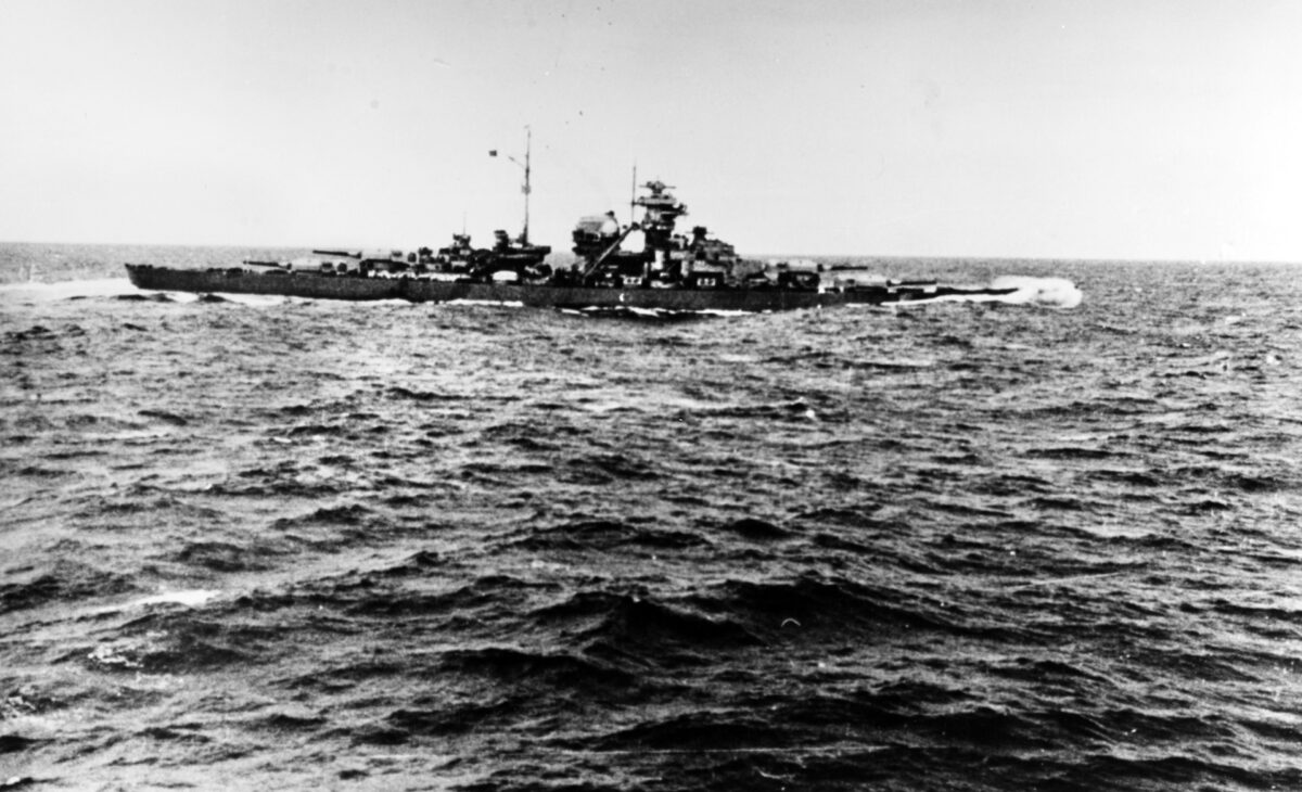 Underway after the engagement, Bismarck is visibly down by the bow, the result of two hits received during the battle. Bismarck would be sunk three days later when the RAF and Royal Navy caught her off the coast of France. Of her 2,221-man crew, only 115 survived.