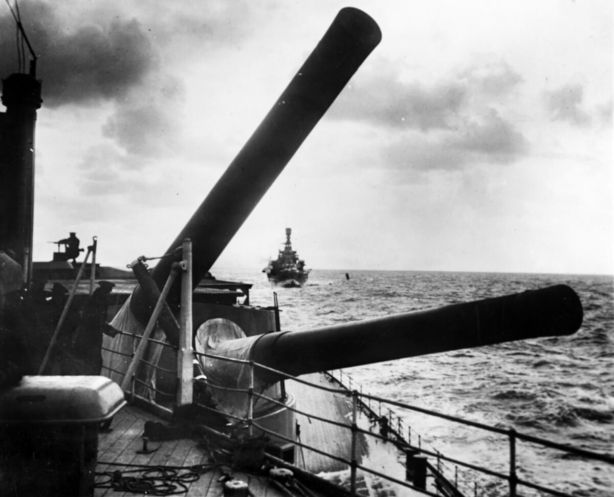 View of Hood looking aft, showing her 15-inch guns, while on maneuvers off Portland, England in 1926. HMS Repluse is visible in the distance.