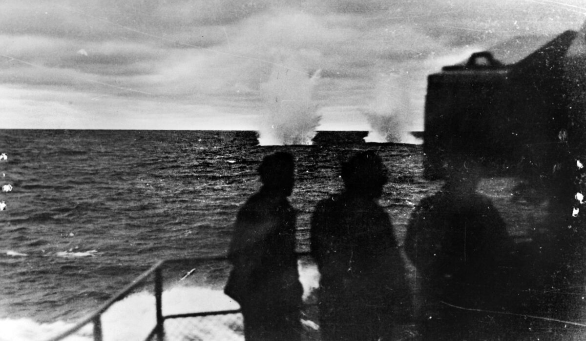 In a photograph taken from Prinz Eugen, one of a series taken during the sea battle, two 15-inch shells from Hood send up spouts of water early in the action.