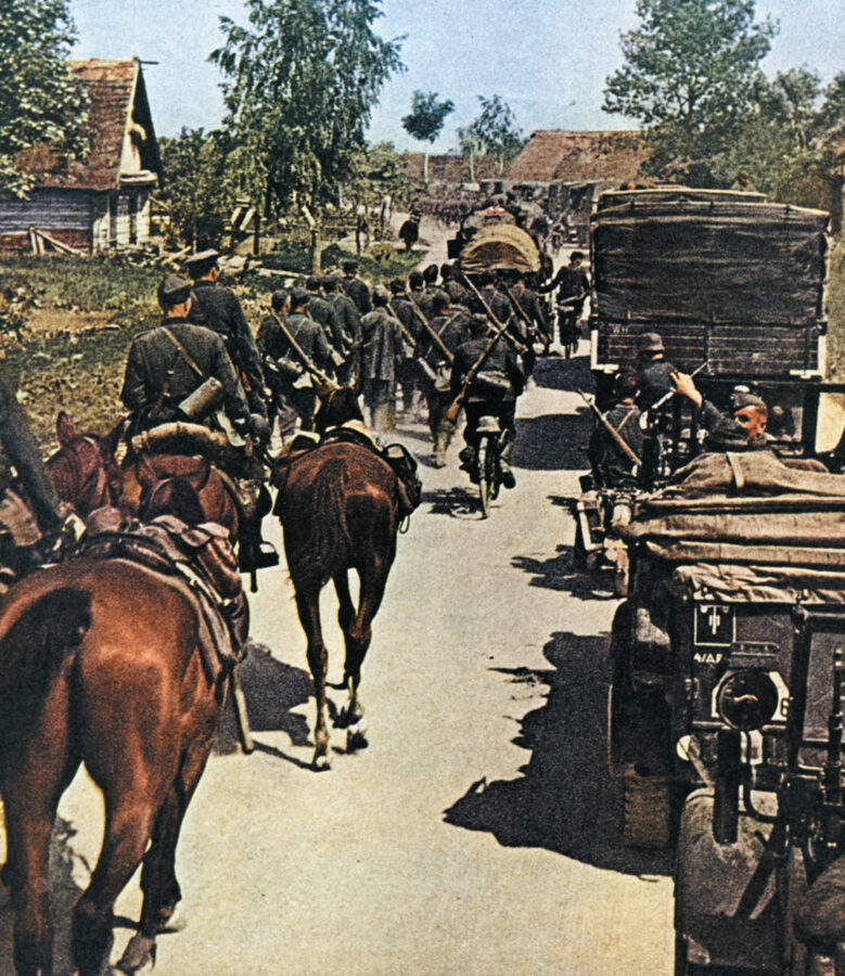 A column of German horsemen illustrates that the beast of burden is still viable on the Eastern Front as it passes a convoy stalled for lack of fuel in a Russian village. The German Sixth Army’s march to Stalingrad was protected overhead by von Richthofen’s aircraft.