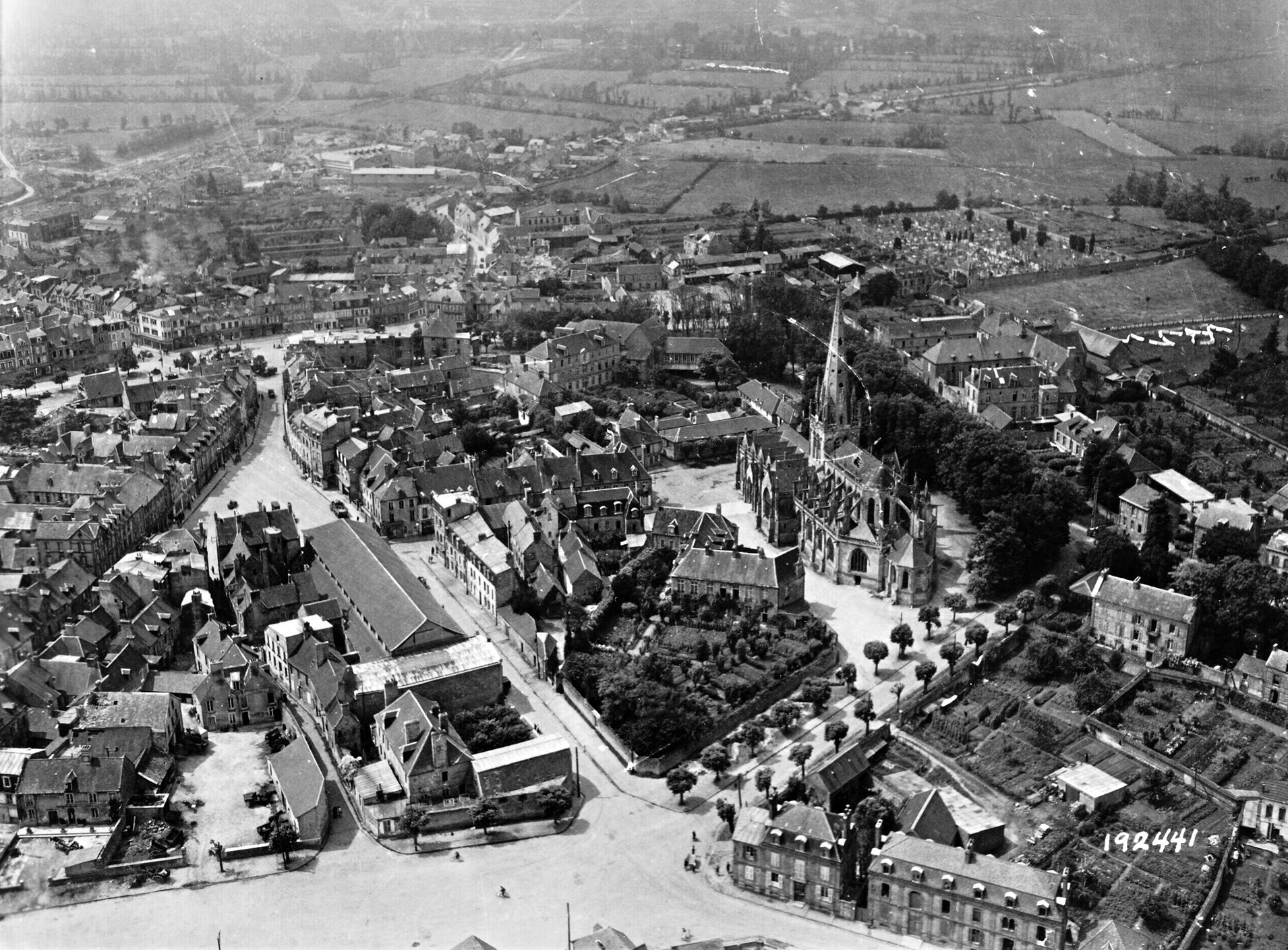 This aerial photo of Carentan, a strategically important location, taken three weeks after the fighting ended, shows little apparent damage.