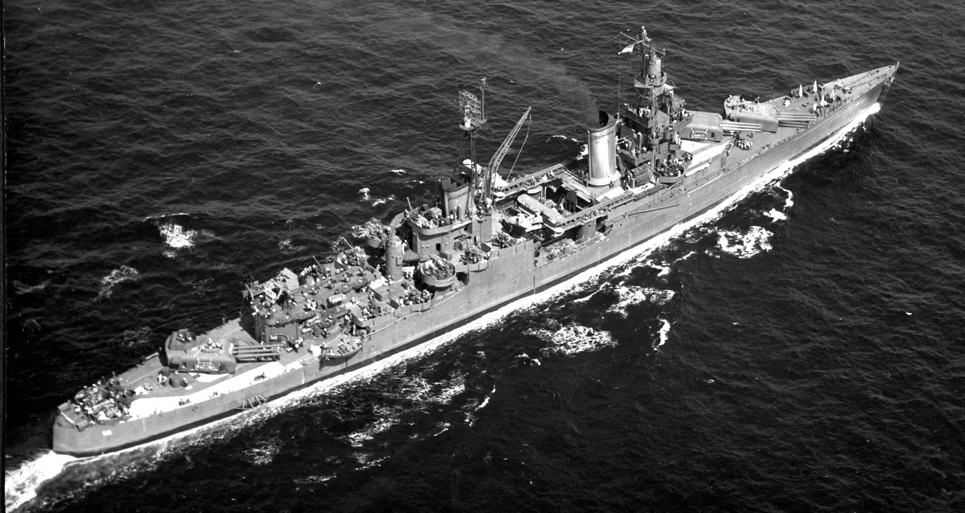 The heavy cruiser USS Indianapolis (CA-35), photographed during the war, was launched in 1931 and earned 10 battle stars before her tragic sinking.