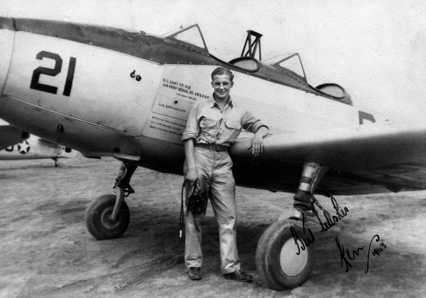  An unidentified pilot stands in front of a PT-19, one of the most popular primary trainers of the war, and the type which Ed Cottrell flew at Visalia, California. 