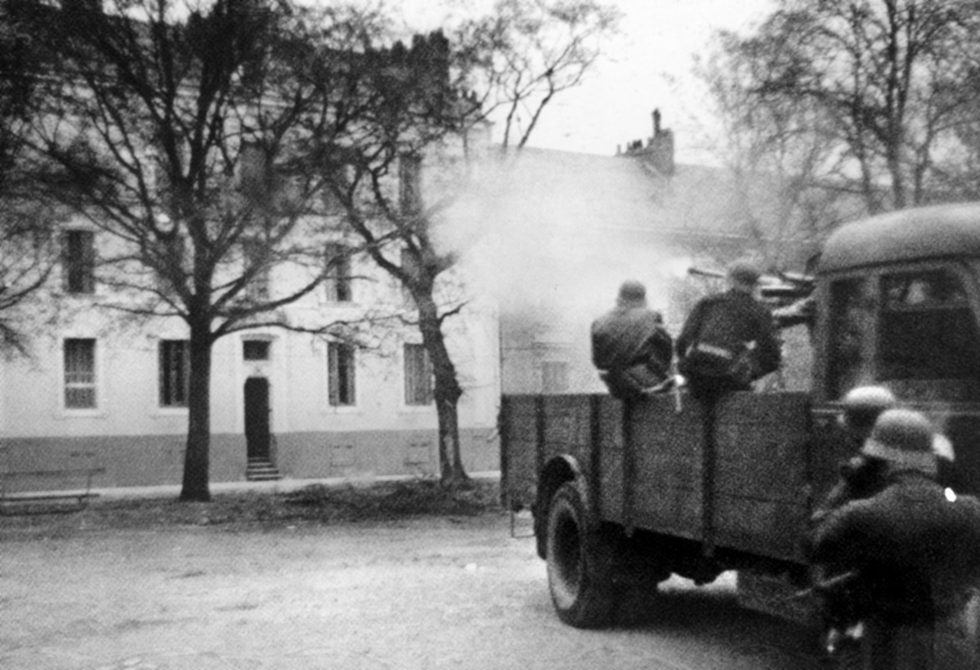 German troops use heavy weapons to try and flush out Commandos believed to be hiding in a house opposite the waterfront. Some 64 Commandos and 105 Royal Navy men died in the costly but successful raid. 