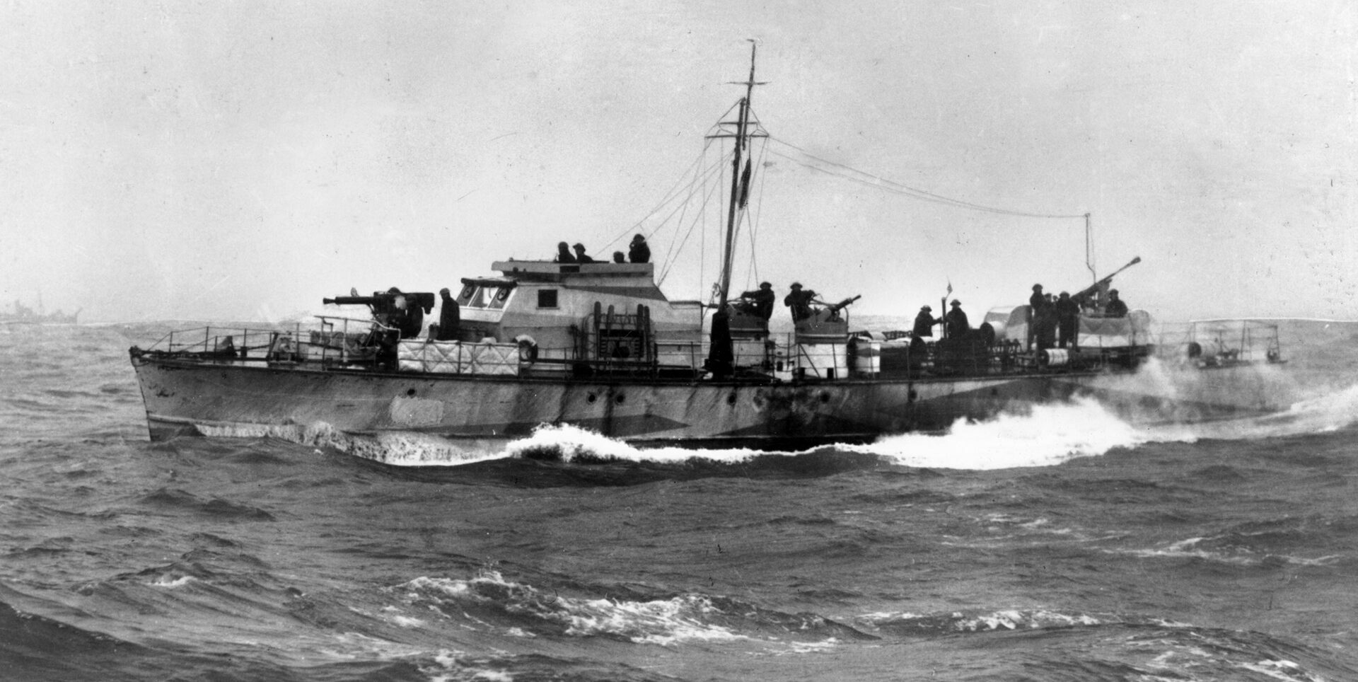 Motor gunboat MGB 314, headquarters ship for Commander Ryder and Lt. Col. Newman, was badly damaged by shore batteries and had to be scuttled.
