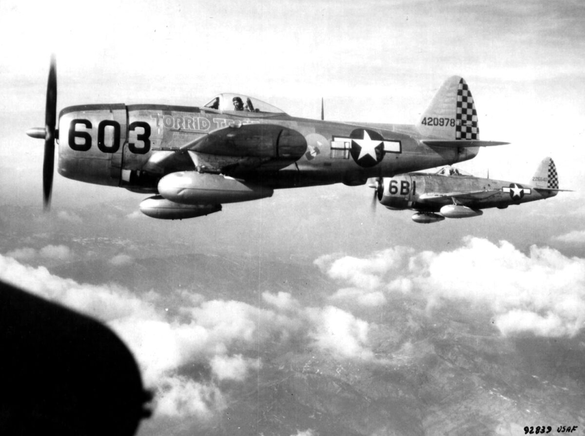 Two P-47D Thunderbolt fighters off the wing of a  B-17. With their limited range, the P-47s could not accompany the bombers to distant targets, but  P-51s could.