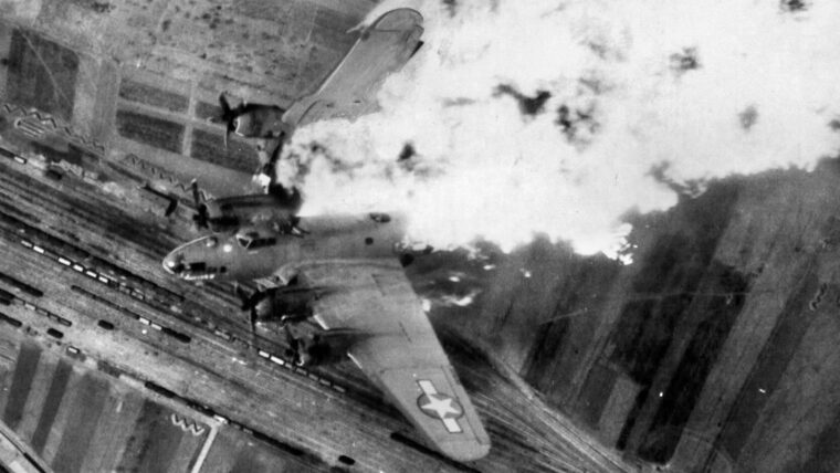 With its right wing on fire and breaking apart, a B-17 from the 483rd Bomb Group flying over rail yards is about to crash in the Yuogoslav city of Nis, April 25, 1944.