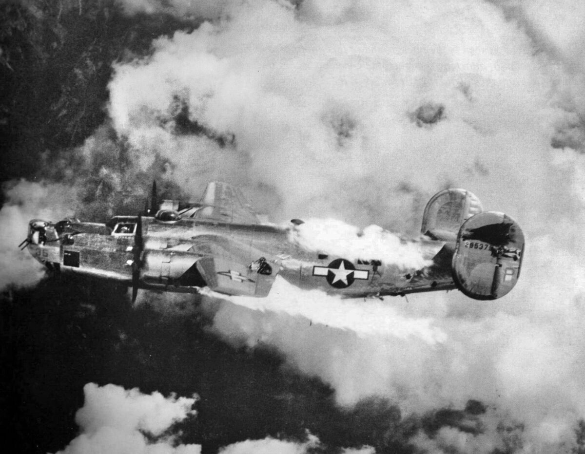 A B-24 Liberator bomber is fully engulfed in fire during an attack by Luftwaffe fighters over Austria, 1942.