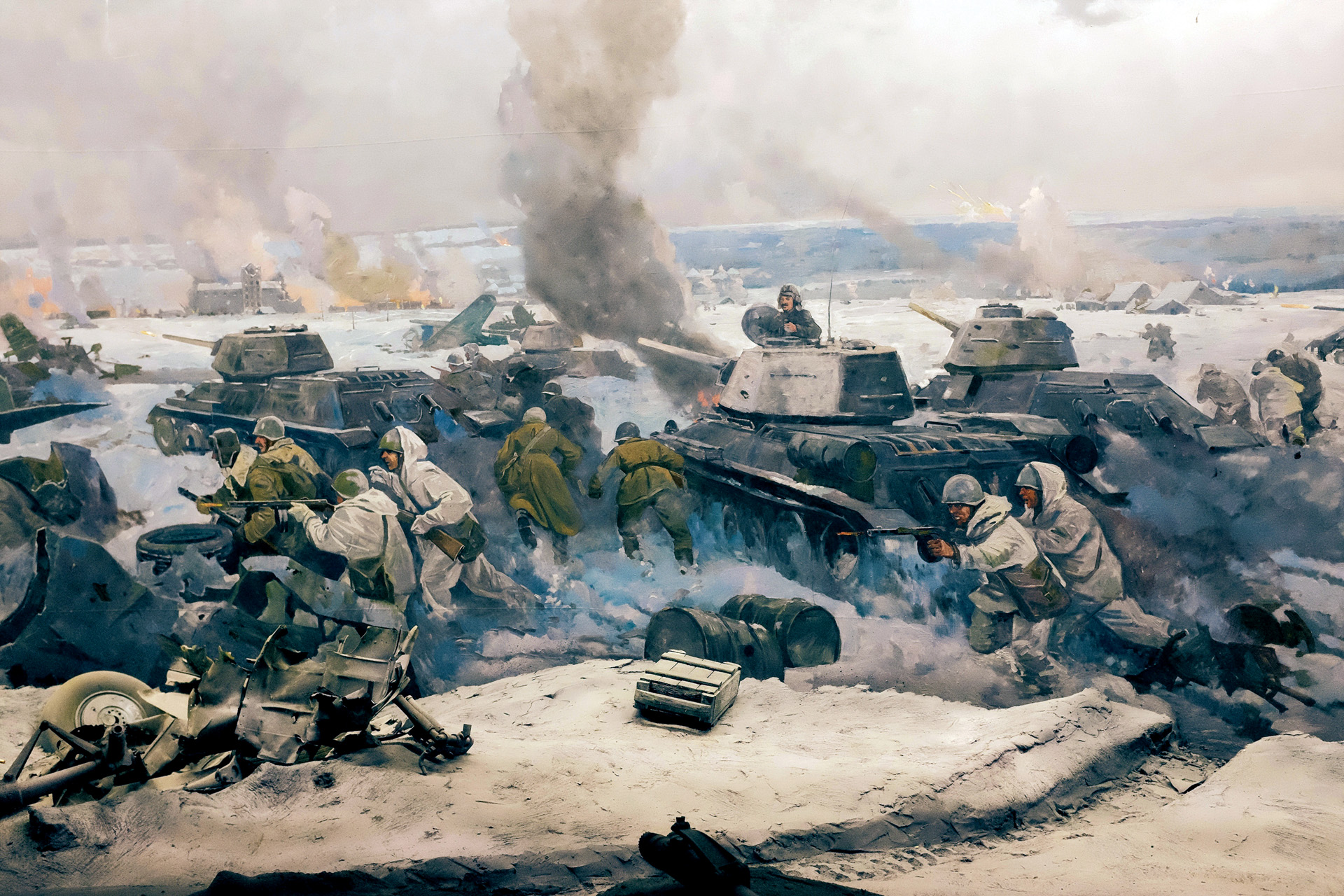 Soviet soldiers and T-34 tanks rush across the frozen landscape to throw back the Germans threatening Stalingrad. The siege lasted five months, resulted in two million deaths, German Sixth Army defeat.