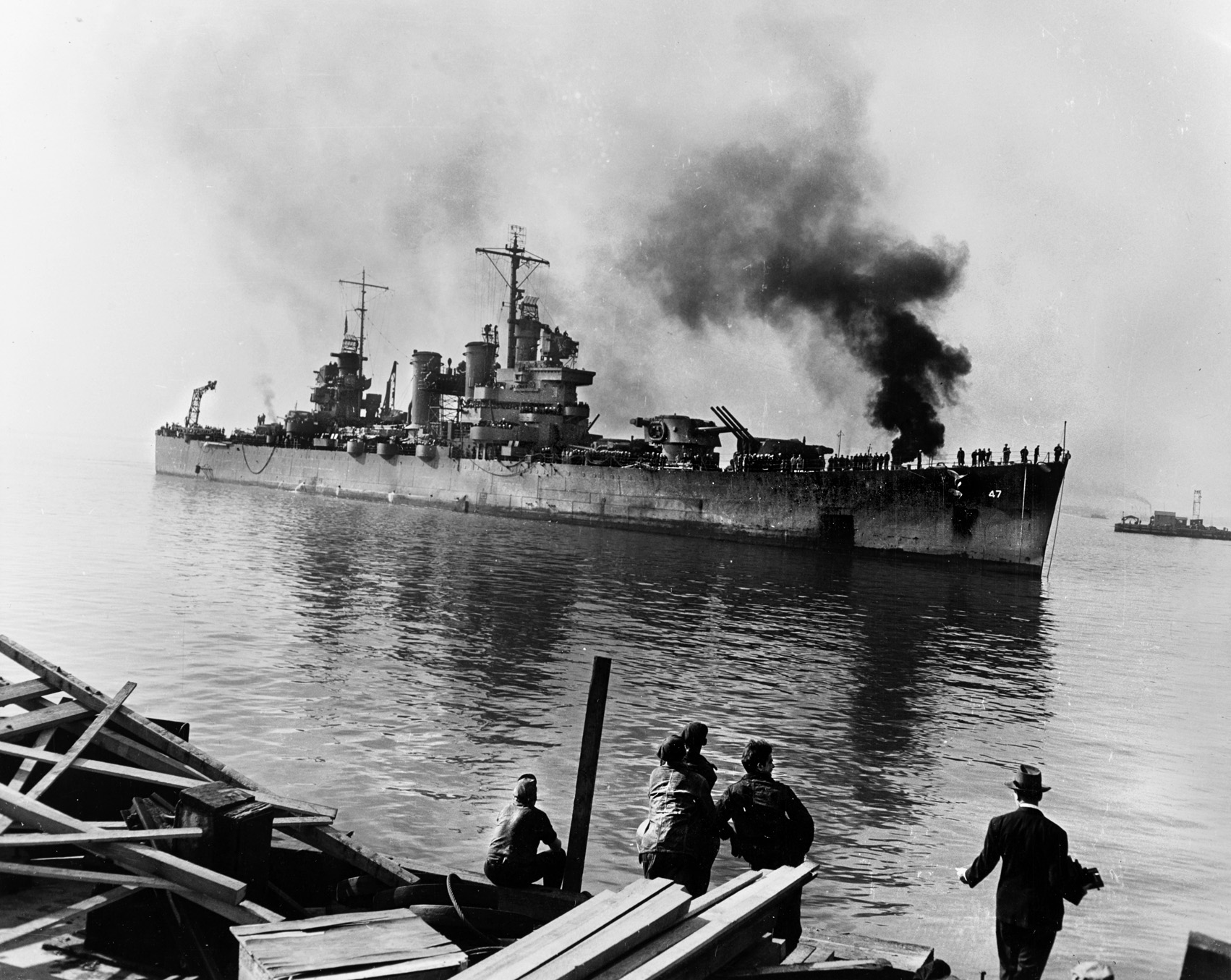 The cruiser USS Boise arrives at Philadelphia Navy Yard for repair of extensive damage suffered during the Battle of Cape Esperance, fought two weeks before the Battle of the Santa Cruz Islands.