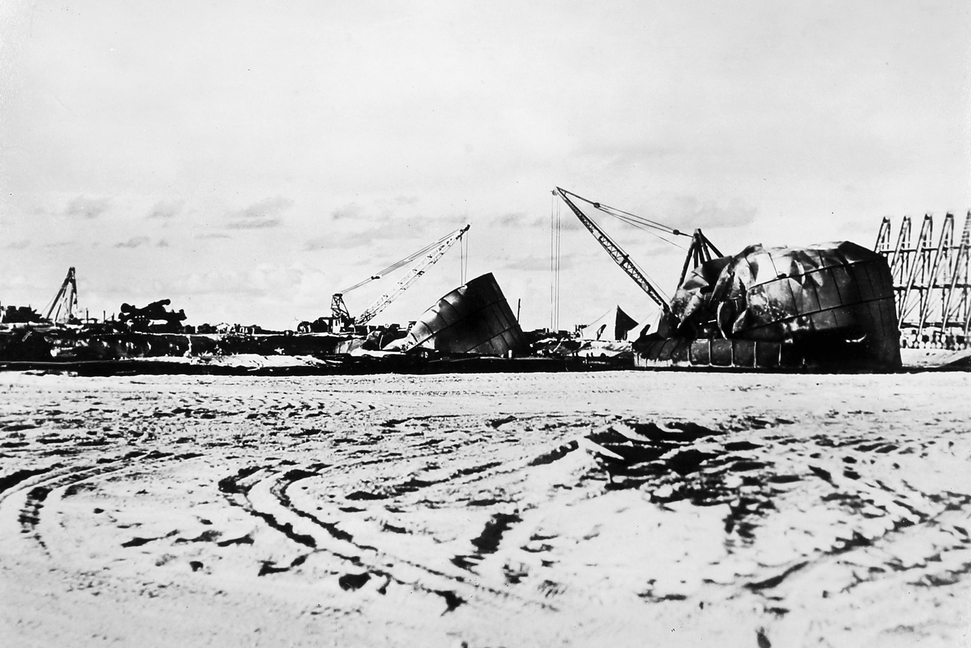  Burned and crumpled fuel storage tanks on Wake, photographed by the Japanese after the island was captured on December 23, 1941.