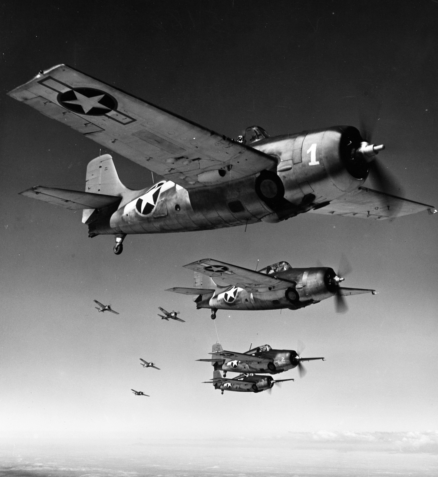 A flight of Grumman F4F Wildcats in tactical formation, mid-1943. The F4F was a tough opponent that could dish out punishment as well as take it.