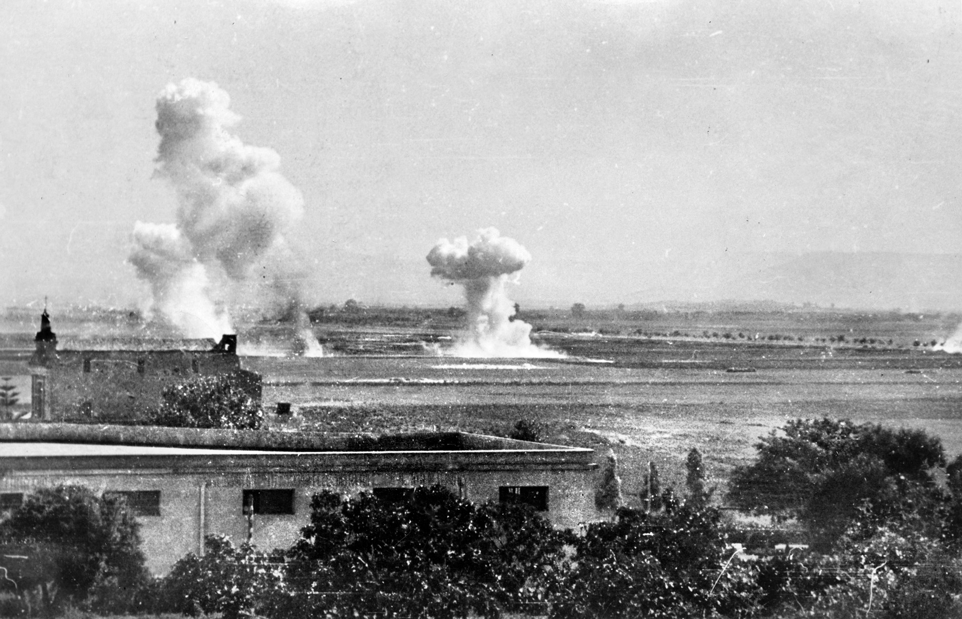 U.S. Navy salvos explode on the plains north of Gela. The bombardment helped stop the Axis attack and sent the enemy retreating north. 