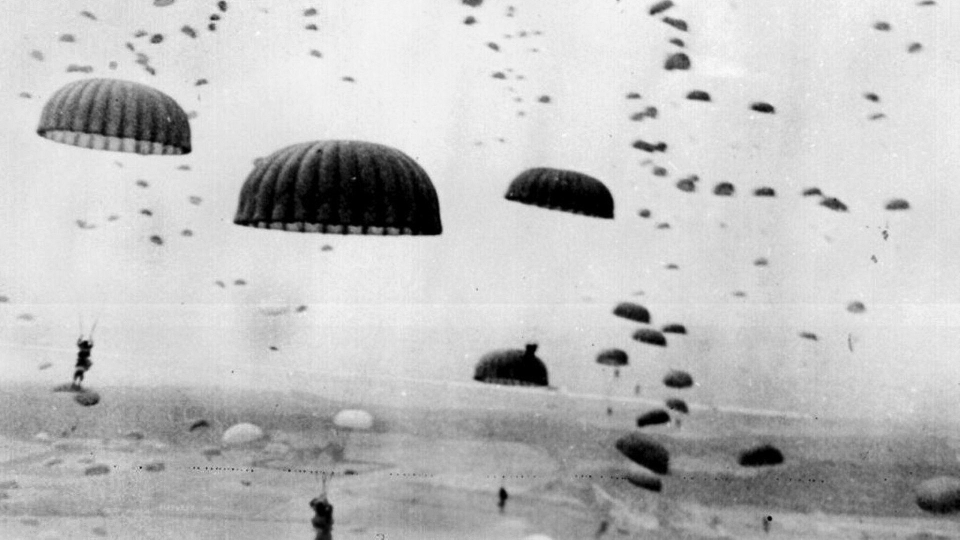 Real paratroopers or fake? The Allies were inspired to use dummy parachutists from the Germans, who deployed decoys during their 1940 attack on the Belgian fortress of Eben-Emael. (Shown here are real Americans during Operation Market Garden.)