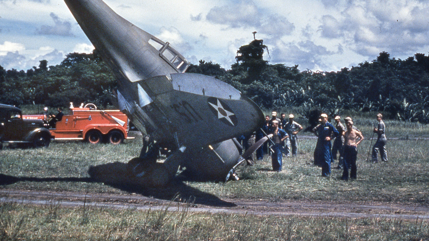 This Seversky P-35 fighter plane has nosed over during a landing at Clark Field in the Philippines. Like other types flown by the 27th Bomb Group, the P-35 was obsolete during World War II and outclassed by Japanese fighter types.