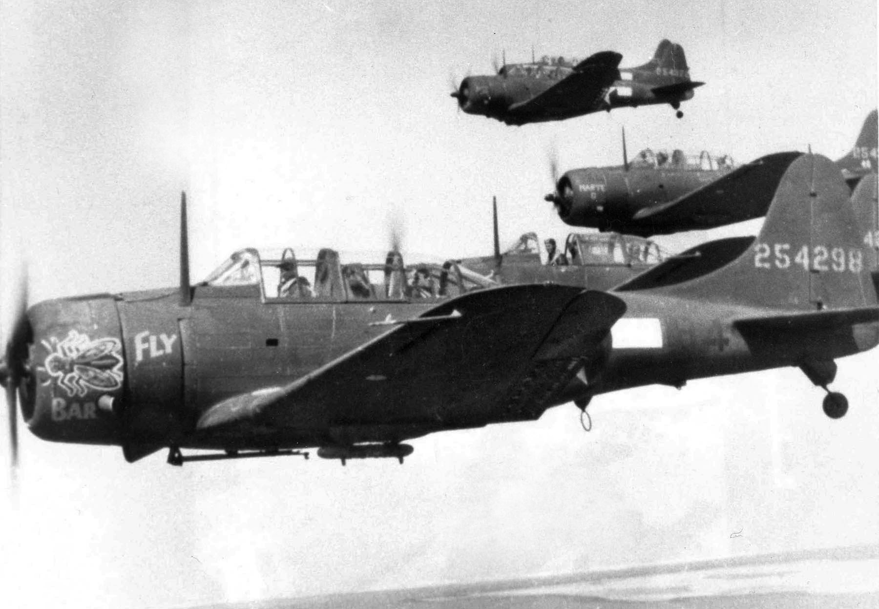 A flight of Douglas A-24 Banshee dive bombers shows its age in this photo. Although these planes managed to get airborne, many of the A-24s supplied to the 27th Bombardment Group were worn out.