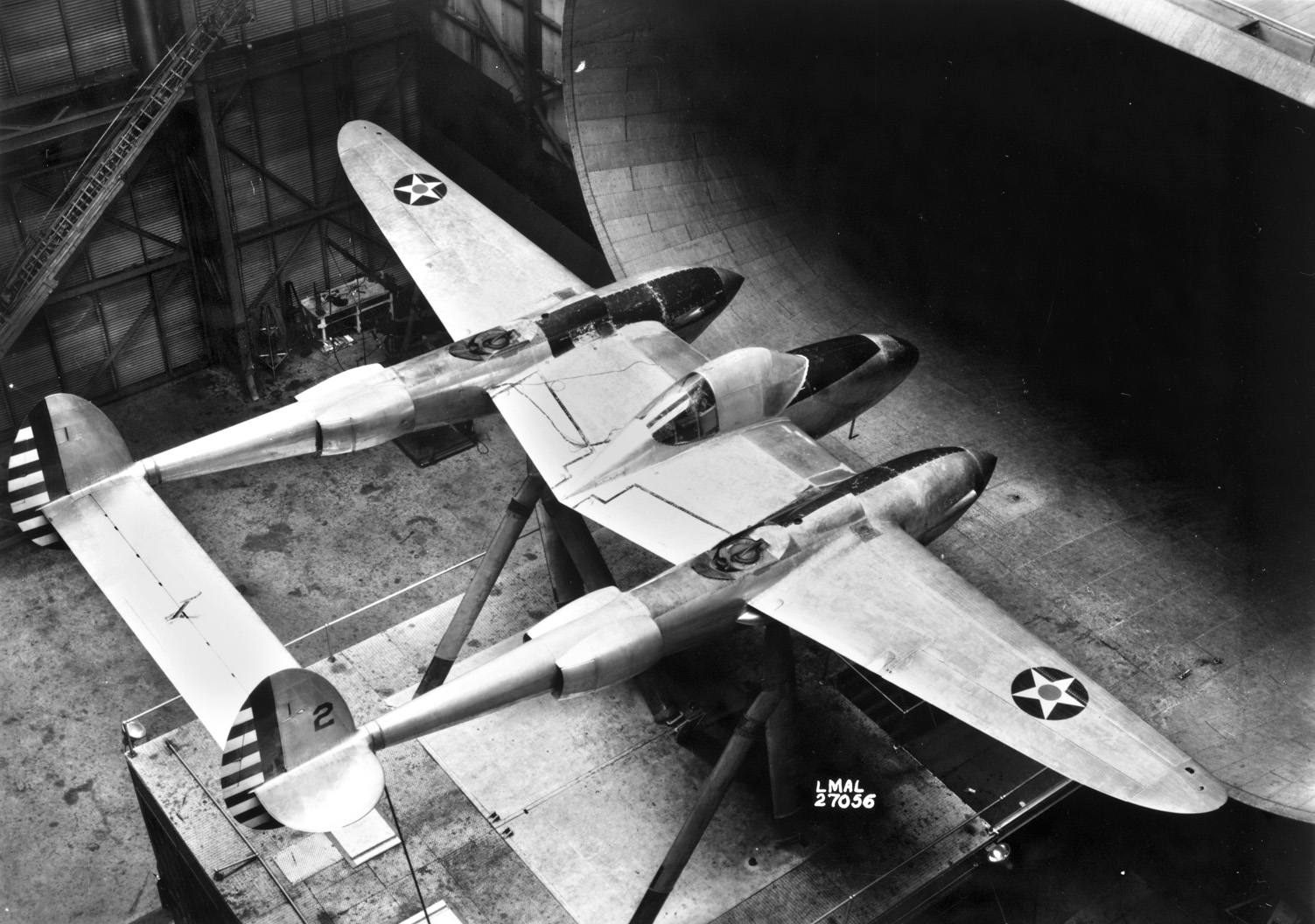 The prototype YP-38 fighter undergoes wind tunnel tests at Lockheed facilities. Engineers with Lockheed developed the twin-engine configuration for the P-38 Lightning to meet the specifications set out by the U.S. Army Air Corps in 1937.