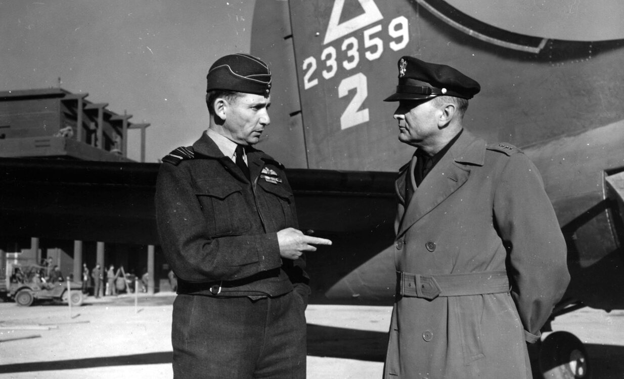  General Eaker (right) stands with British Marshal of the Royal Air Force Arthur Tedder. Eaker was disappointed when he was transferred from England to command of Allied Air Forces in the Mediterranean prior to D-Day.  
