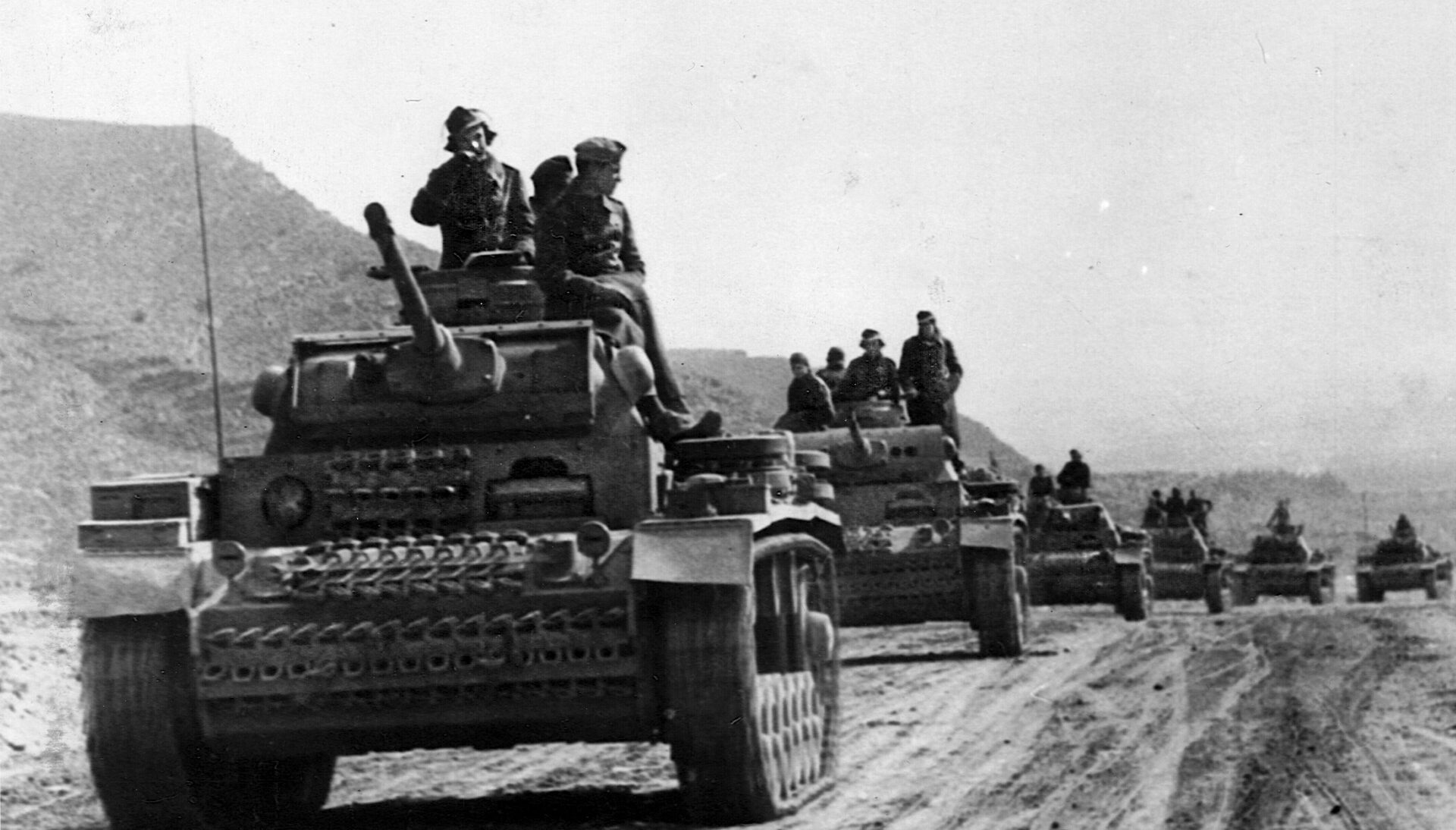 A column of German tanks rolls forward during the fighting at Gazala. Field Marshal Rommel seized the initiative and drove the British and Free French from the Gazala Line, but by the end of June the Allied forces had formed a new defensive line at El Alamein.