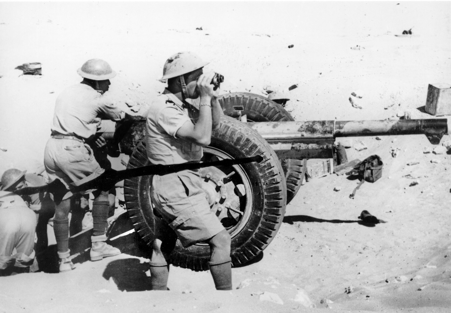 The crew of a Free French anti-tank gun prepares for action in the desert. The Free French garrison of the defensive position at Bir Hacheim proved a tough nut for the Germans to crack during their June 1942 offensive. 