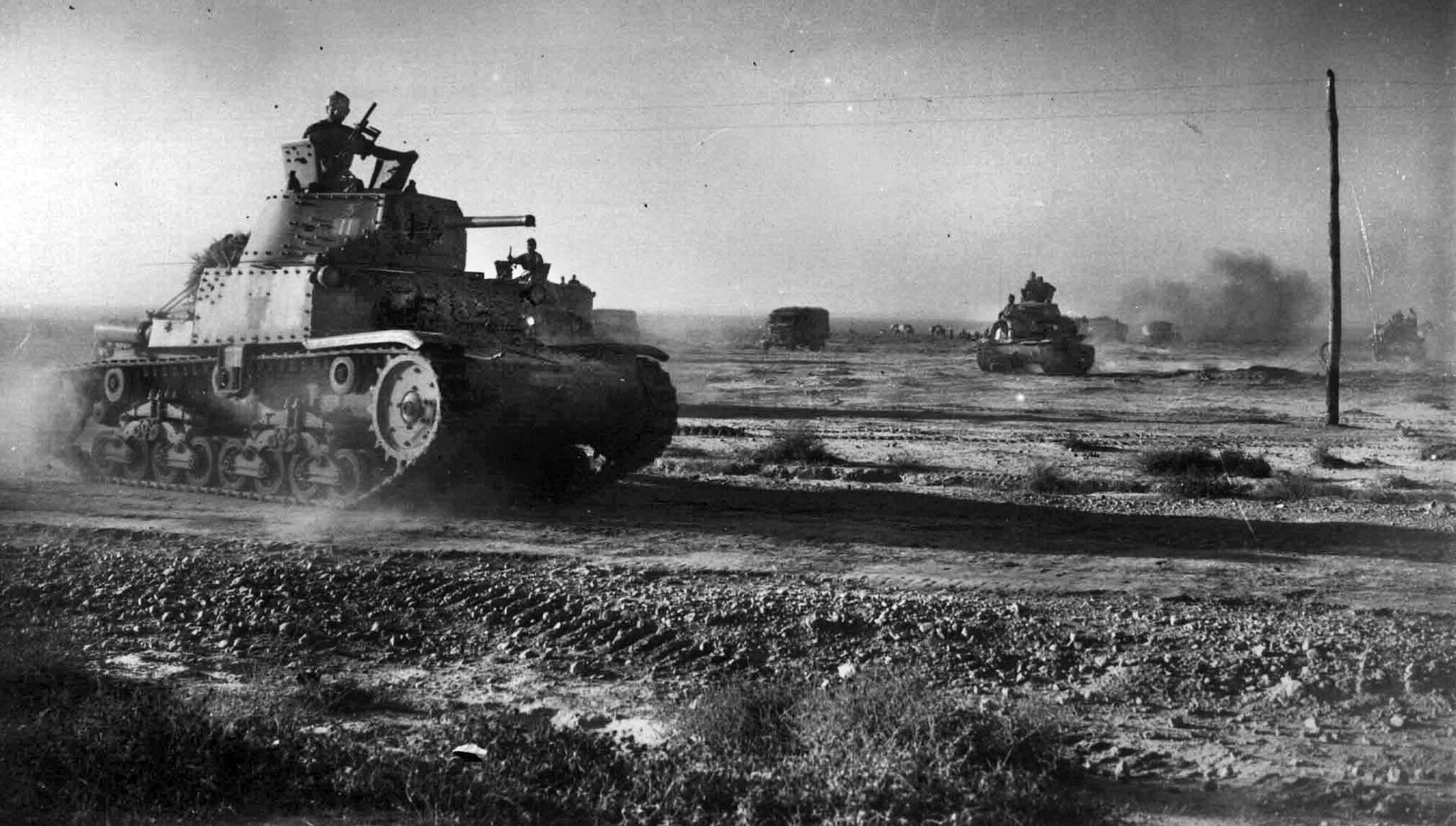 An Italian M13/40 tank of the Ariete Division is silhouetted against the horizon during the fighting of June 10, 1942.